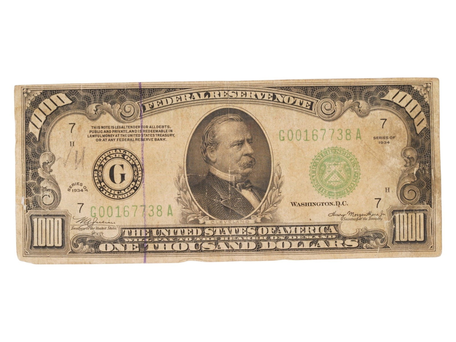 1934 FEDERAL RESERVE NOTE ONE THOUSAND DOLLAR BILL: A 1934 Federal Reserve Note features a face value of one thousand dollars and was issued by the Federal Reserve Bank of Chicago, Illinois, as indicated by the G district seal and numerical identifiers