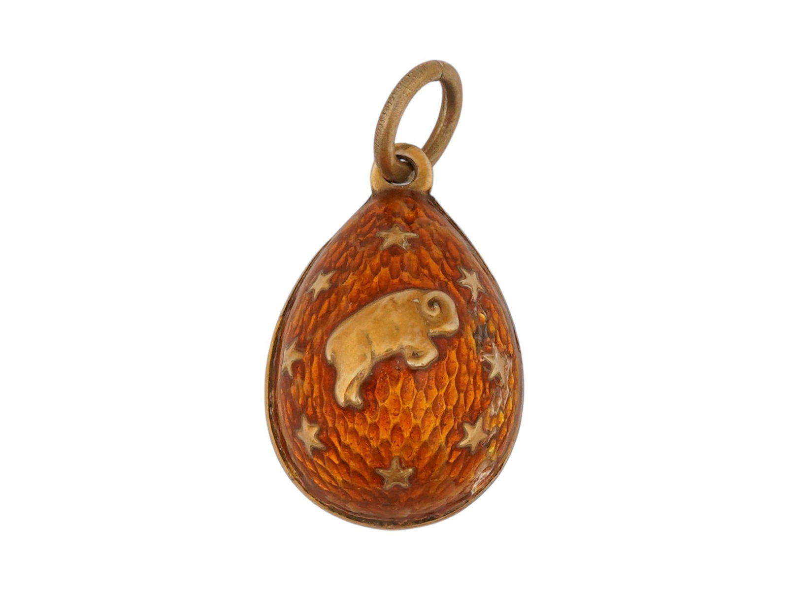 RUSSIAN GILT SILVER GUILLOCHE ENAMEL EASTER EGG PENDANT: A Russian gilt silver Easter Egg pendant. Blue and red guilloche enamel surface. Aries zodiac sign and stars motifs on both sides. Hallmarked with an 84 Russian silver standard and makers mark on the