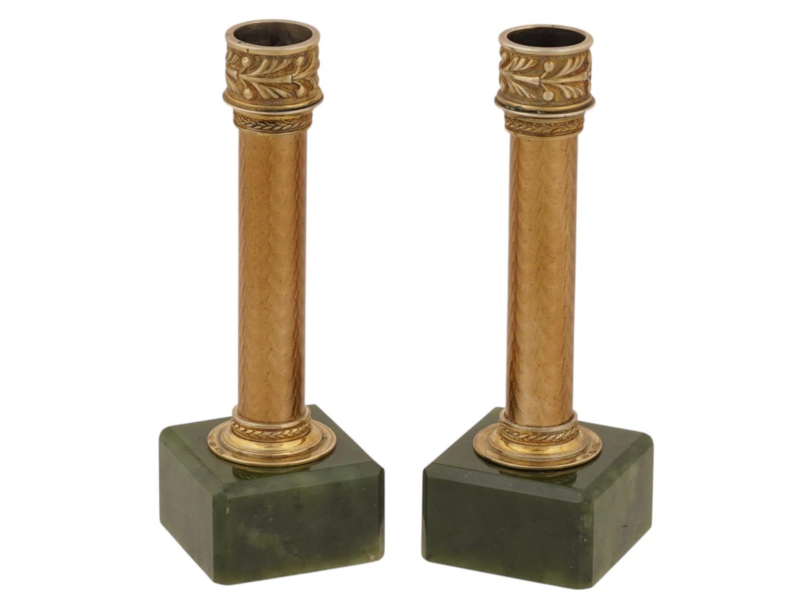 TWO RUSSIAN GILT SILVER GUILLOCHE ENAMEL CANDLESTICKS: A pair of Russian gilt silver candlesticks, each is modeled as a column covered with an enamel over a guilloche ground. Mounted on a carved nephrite jade square base. Hallmarked with the 88 Russian si