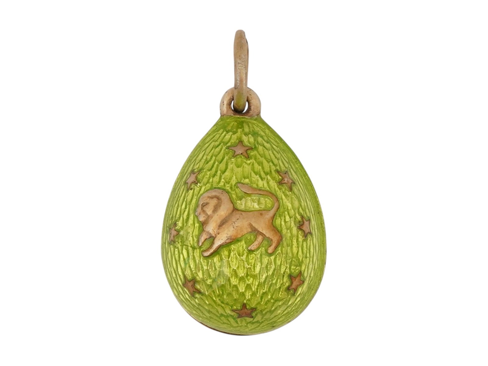 RUSSIAN SILVER GUILLOCHE ENAMEL EASTER EGG PENDANT: A Russian gilt silver Easter Egg pendant. Green guilloche enamel surface. Leo zodiac sign and stars motifs on both sides. Hallmarked with an 88 Russian silver standard and makers mark on the fitting