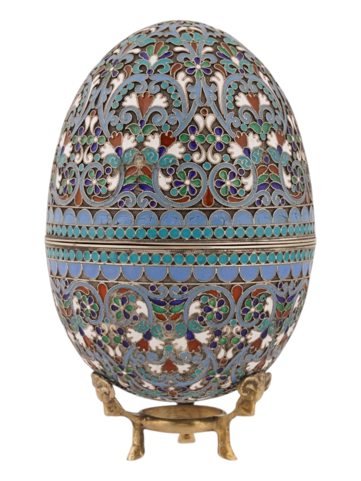 RUSSIAN SILVER CLOISONNE ENAMEL EASTER EGG W STAND: A large Russian silver Easter Egg casket. Elaborate floral cloisonne enamel surface.Hallmark of 84 silver standard and makers mark are on the rims. The piece comes with a gilt silver rams head stand.