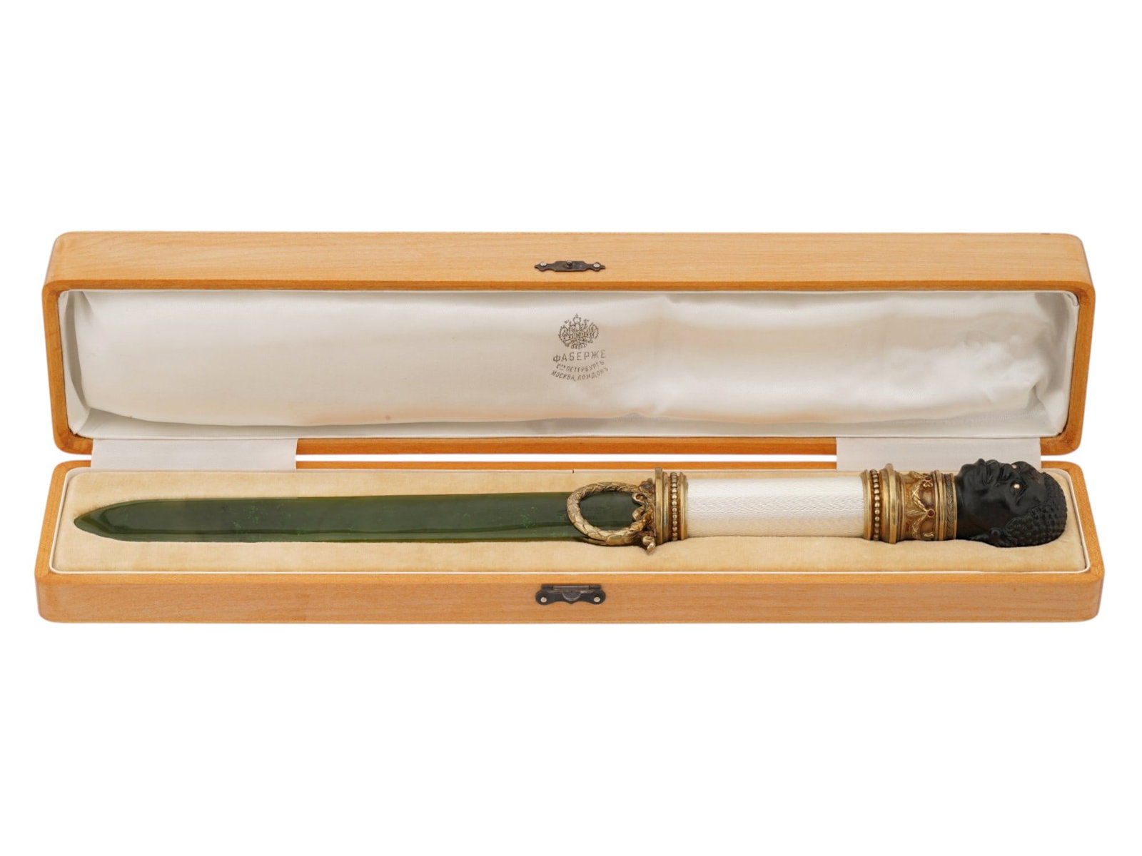RUSSIAN GILT SILVER ENAMEL JADE LETTER OPENER KNIFE: A Russian gilt silver letter opener knife, featuring a carved nephrite jade blade and a white guilloche enamel handle. The piece is finished with a head-shaped carved black jade finial set with diamon
