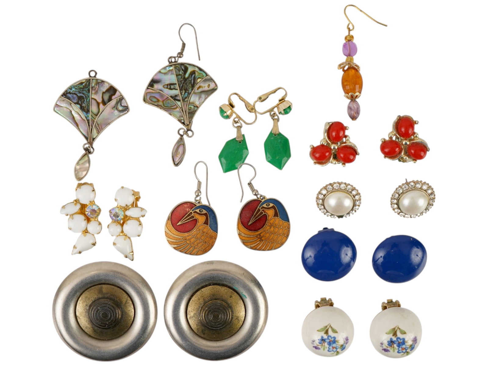 VINTAGE COSTUME JEWELRY HOOK STUD AND CLIP EARRINGS: A lot of vintage costume jewelry. The lot includes hook earrings, stud earrings, and clip earrings of various shapes and designs, including mother-of-pearl. Circa mid to late 20th century. Vintage and