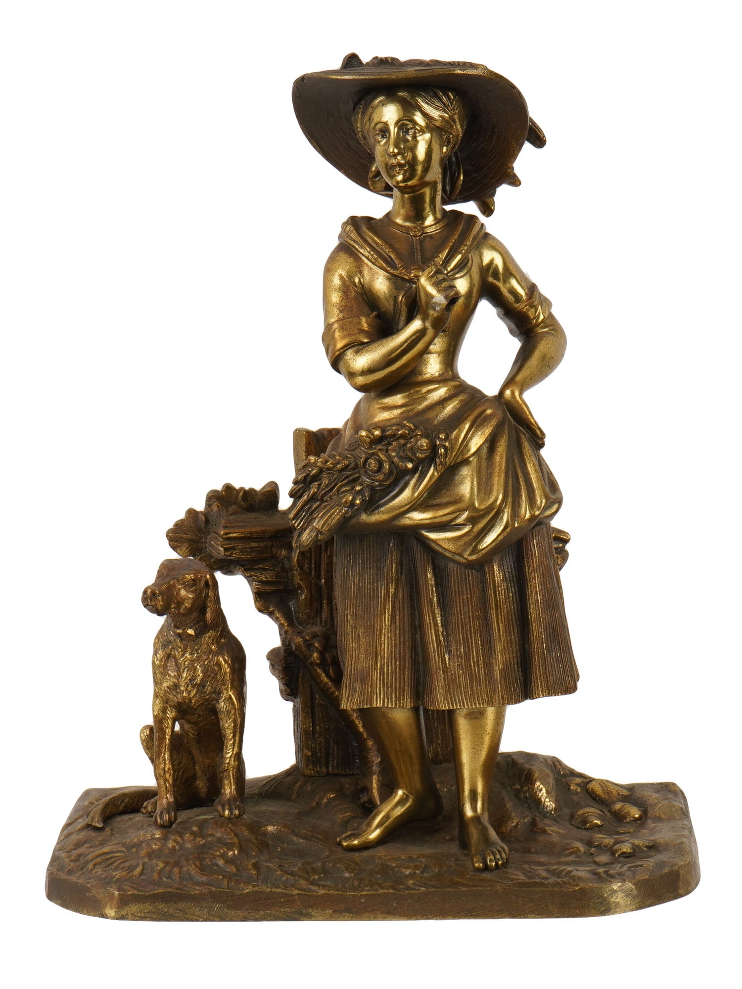 EUROPEAN PATINATED BRONZE SCULPTURE OF WOMAN DOG: A European manner, probably French, patinated bronze sculpture depicting a woman in a wide brimmed hat, skirt, and light blouse holds ears of wheat or a harvested crop in her lap and a dog seated near