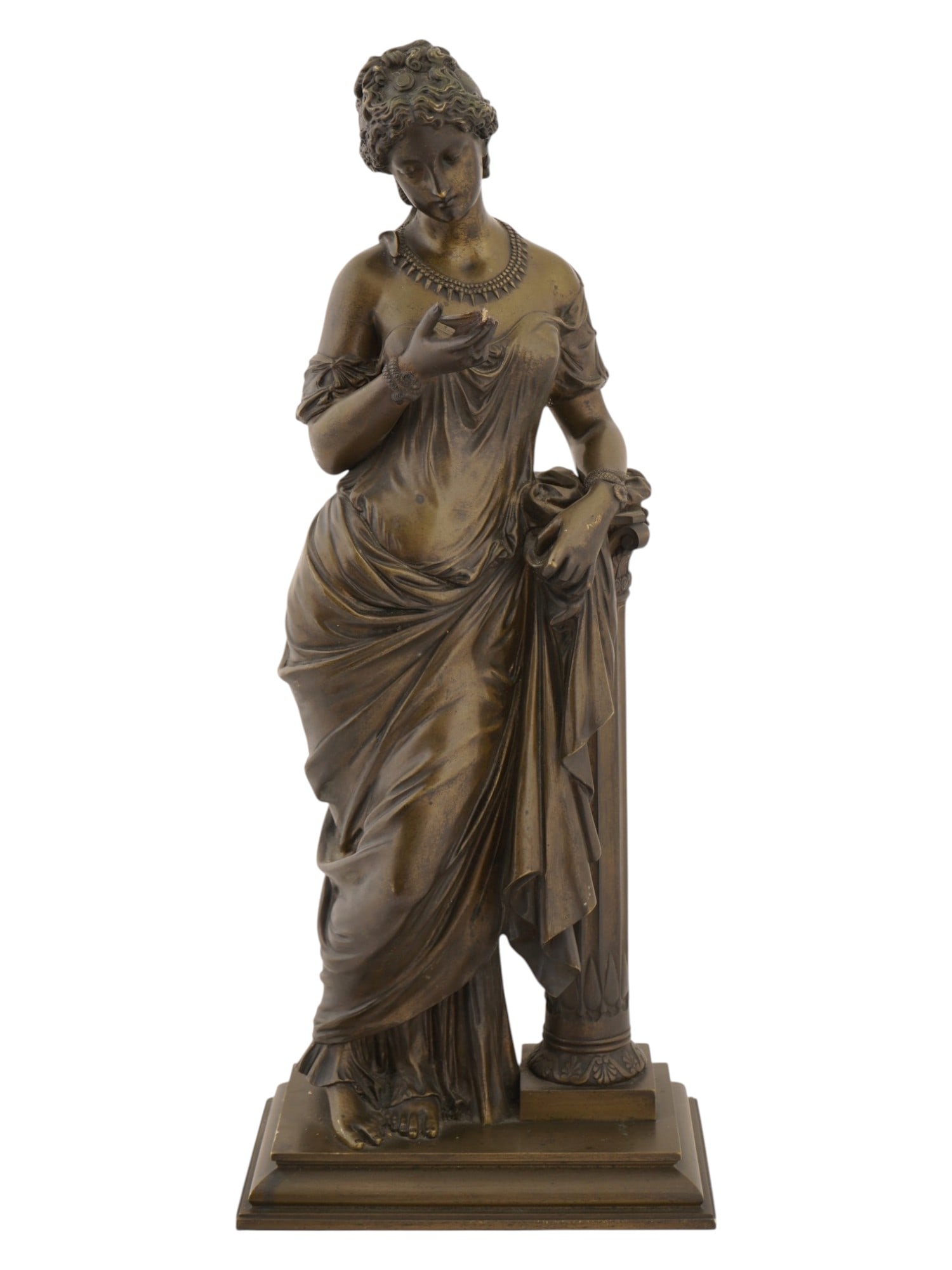 NEOCLASSICAL CAST BRONZE FEMALE SCULPTURE: A cast bronze sculpture depicts a standing female figure in classical attire, leaning gracefully against a fluted rectangular pedestal. The subject is rendered with finely detailed drapery that cascad
