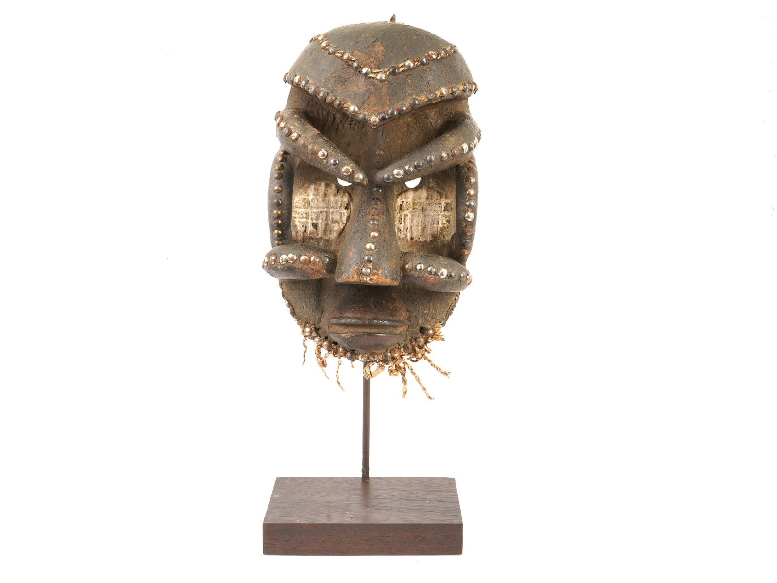 ANTIQUE 19TH CEN AFRICAN BETE PEOPLE CEREMONIAL MASK: An antique 19th century African ceremonial mask, attributed to the Bete people of the Ivory Coast, is hand-carved from a single block of wood and features an aggressive aesthetic characteristic of the