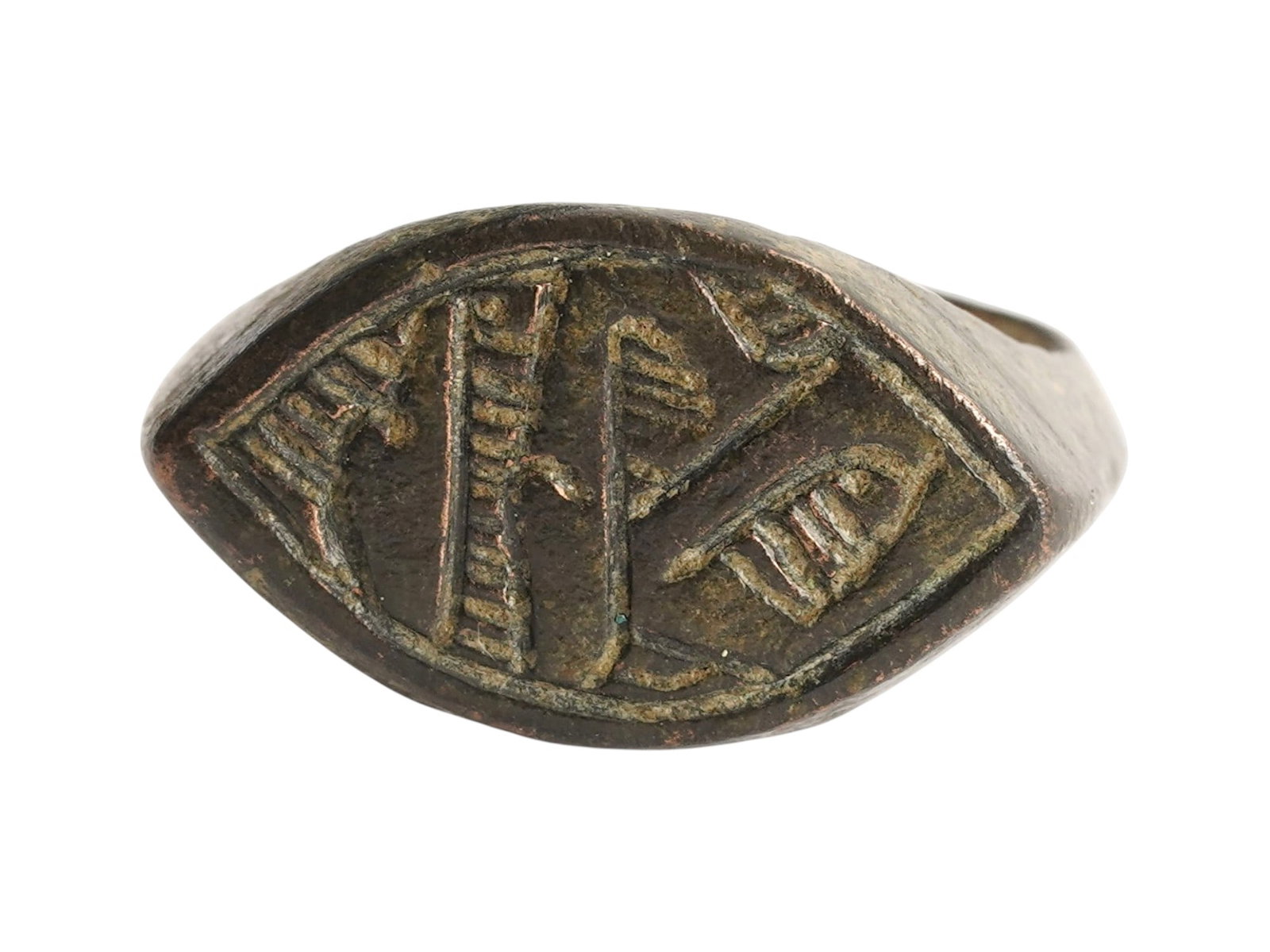 ANCIENT EGYPTIAN ENGRAVED BRONZE RING 200 TO 100 BC: An ancient Egyptian bronze signet ring. The ring is adorned with an engraved design representing traditional symbols. Circa: Late Period, 200 to 100 BC. Historical Finds And Archaeological Relics, Jew