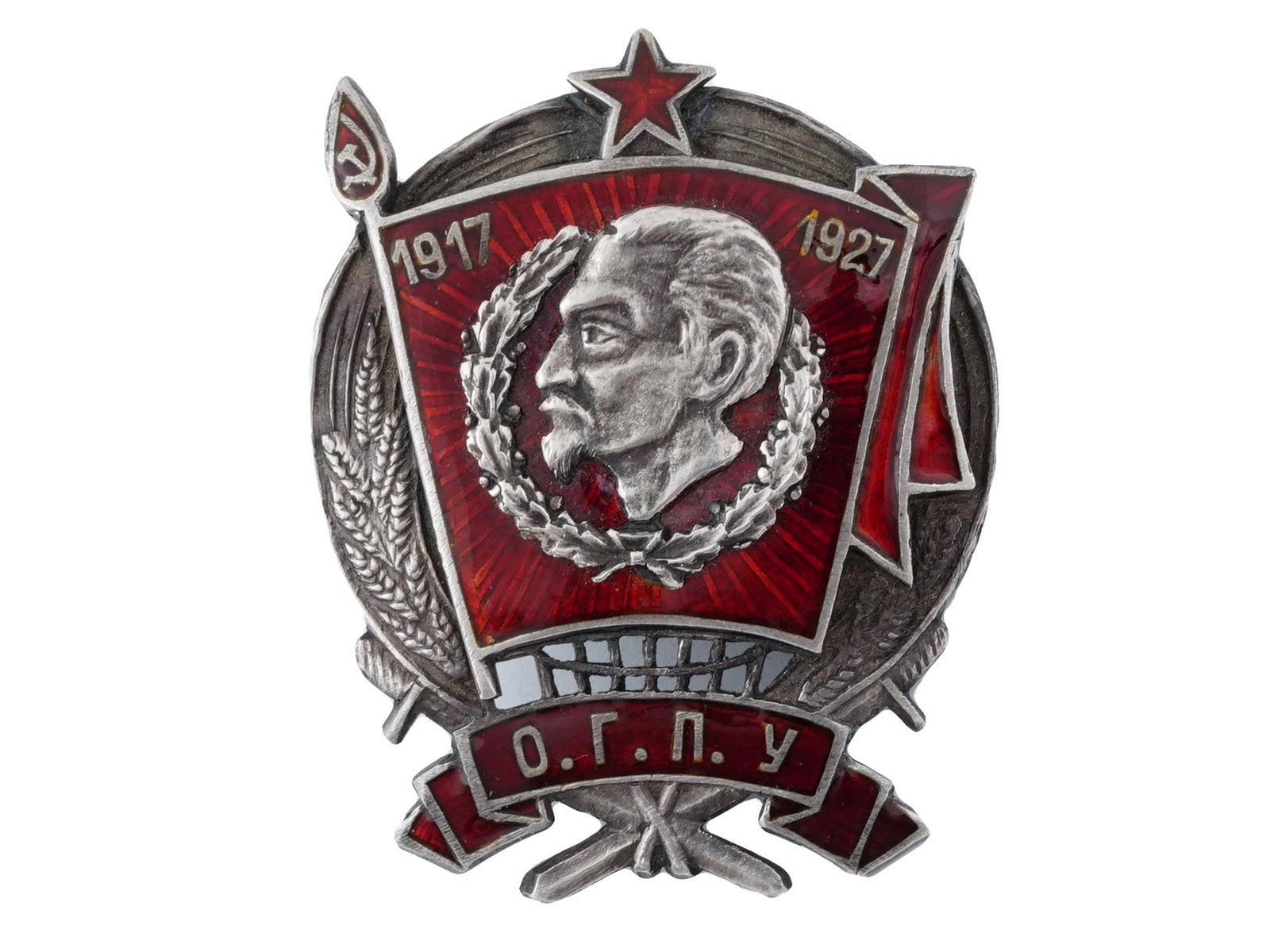SOVIET ERA SILVER BADGE 10 YEARS OF OGPU W DZERZHINSKY: A Soviet era the jubilee silver badge 10 Years Of The OGPU, 1917 to 1927. This badge was established in 1927 for the 10th anniversary of the OGPU. The badge is oval shaped and features a portrait of D