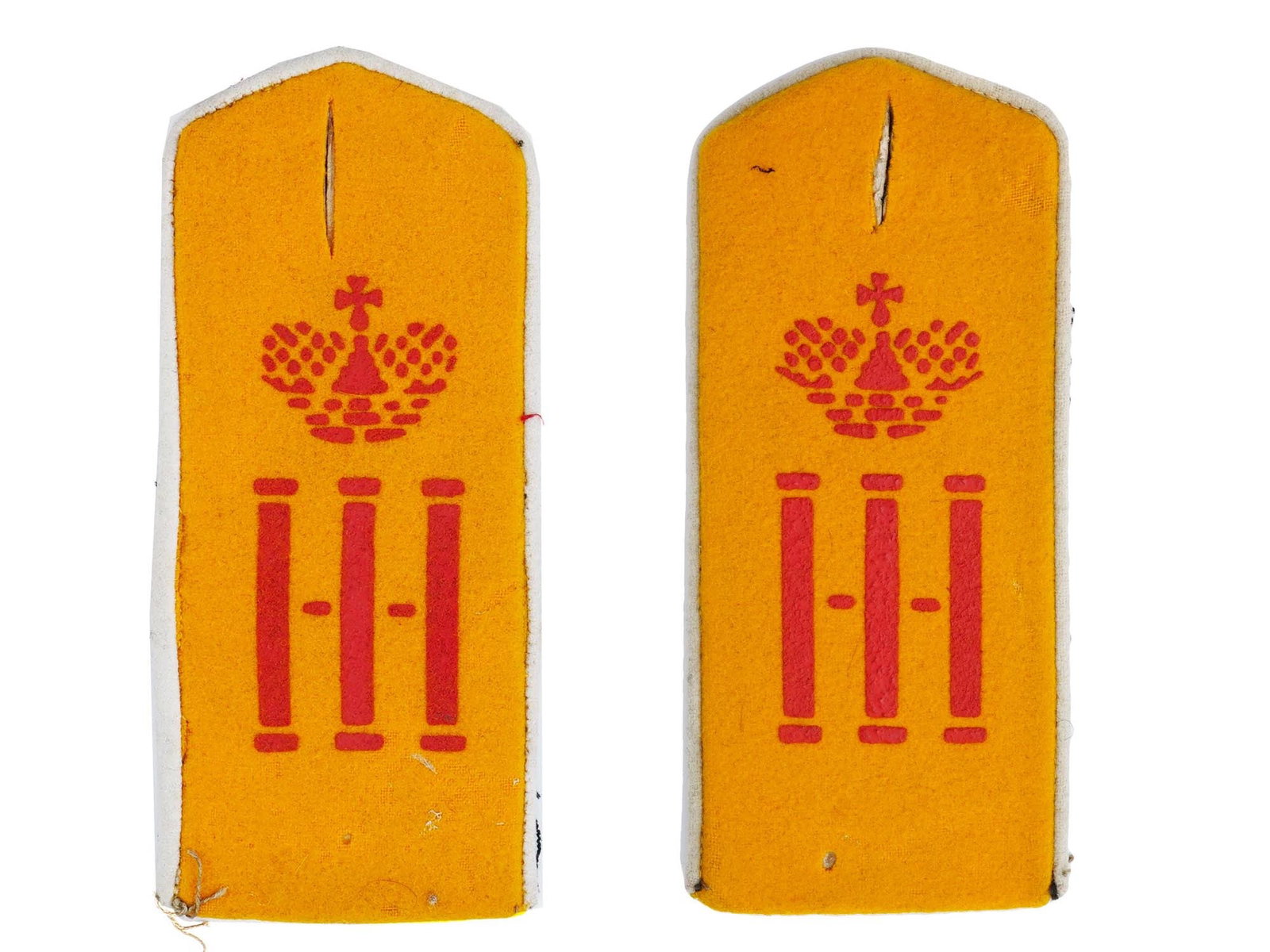 ANTIQUE RUSSIAN EMPIRE MILITARY SHOULDER BOARDS: A pair of antique Russian Empire shoulder boards for a private of the 9th Grenadier Siberian Field Marshal General Grand Duke Nicholas Nikolaevich of Russia Regiment. Crafted from wool and cloth, pain