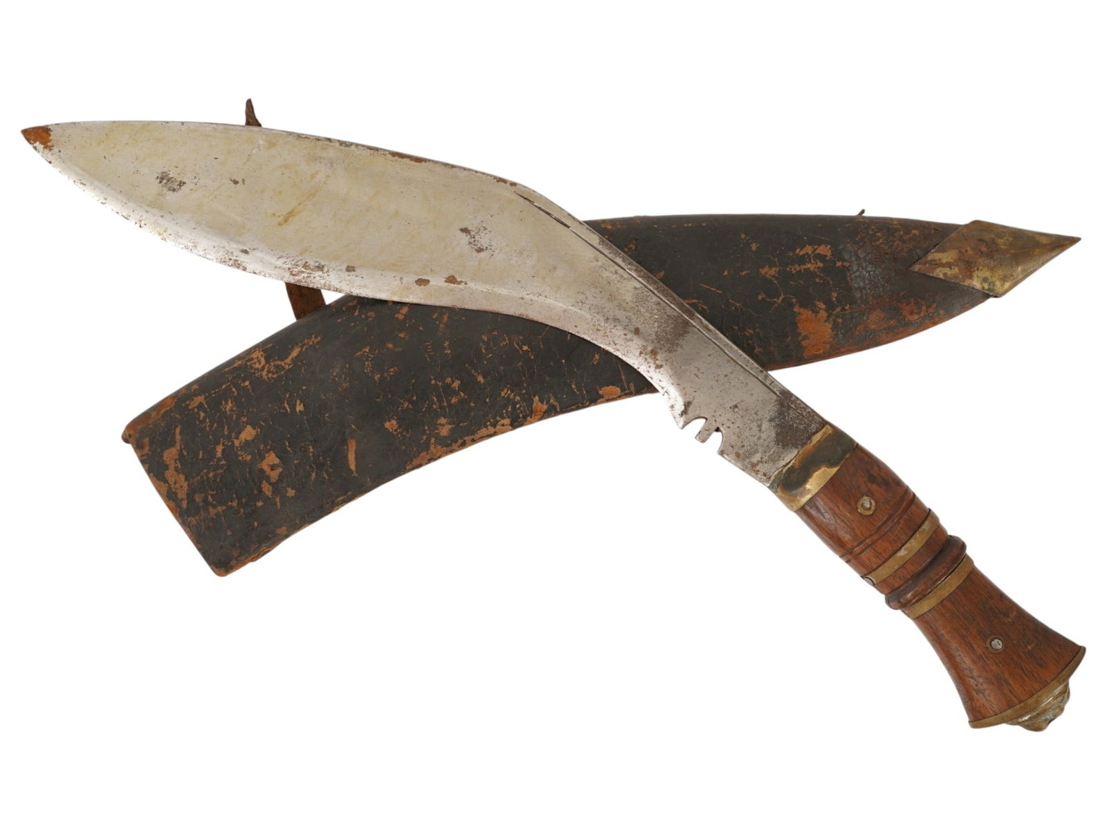 NEPALESE GURKHA KUKRI KNIFE WITH LEATHER SHEATH: A Nepalese kukri features a characteristic recurved steel blade with a single cutting edge and a distinct notch near the bolster. The hilt is constructed from carved wood with a central grip ring and
