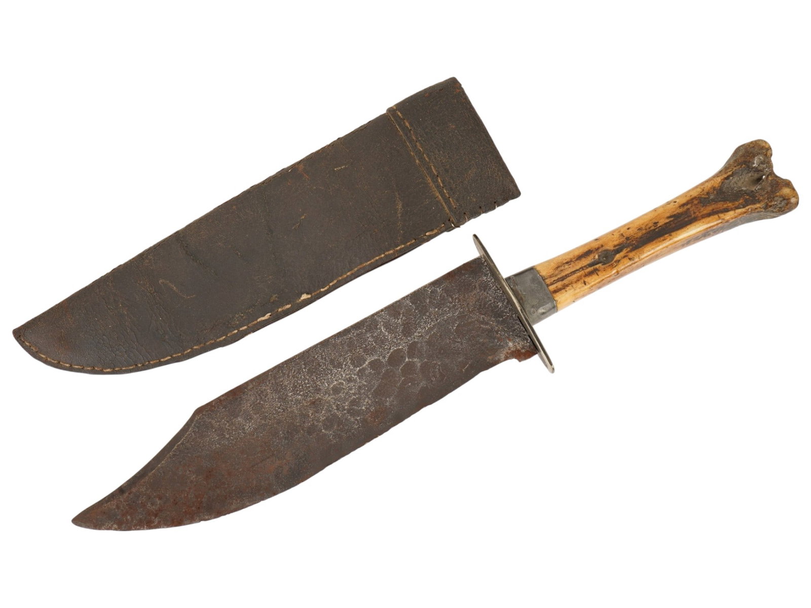 BONE HANDLE BOWIE KNIFE WITH LEATHER SHEATH: An authentic, rustic frontier-style clip point Bowie knife, demonstrating classic hand-forged craftsmanship. The heavy, broad carbon steel blade features a distinct clipped point, flat ground