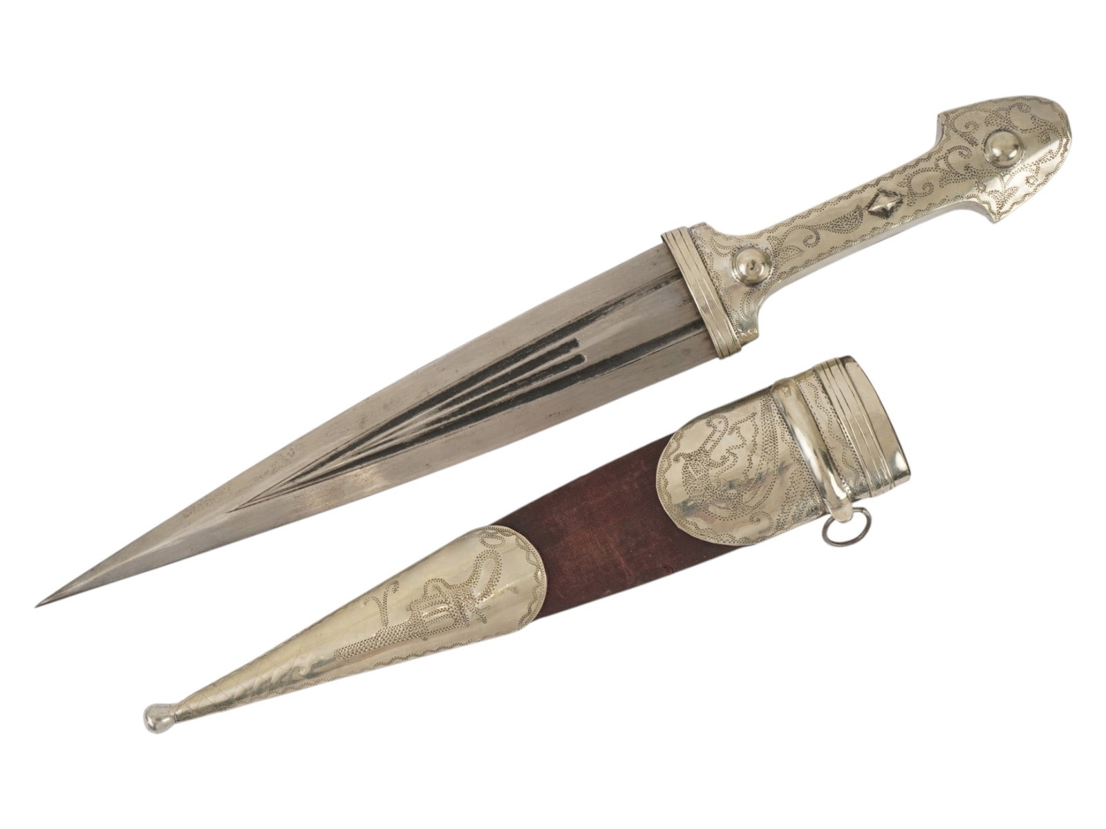 CAUCASIAN IRBIS DECORATIVE DAGGER WITH SHEATH: A decorative dagger from North Caucasus known as Irbis. Spear-point blade. Fine elongated grip with etched scroll motif. Brown leather sheath with metal overlay of matching design, single suspension