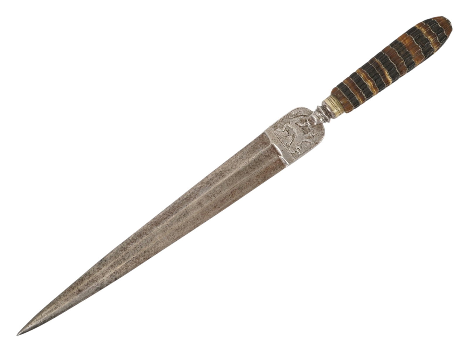 ANTIQUE ITALIAN STEEL STILETTO DAGGER W HORN HANDLE: An antique Italian dagger. It features a solid, straight, double-edged steel blade tapering to a sharp point. The broad base is flat and showcases intricate low-relief engraving, which depicts a lion