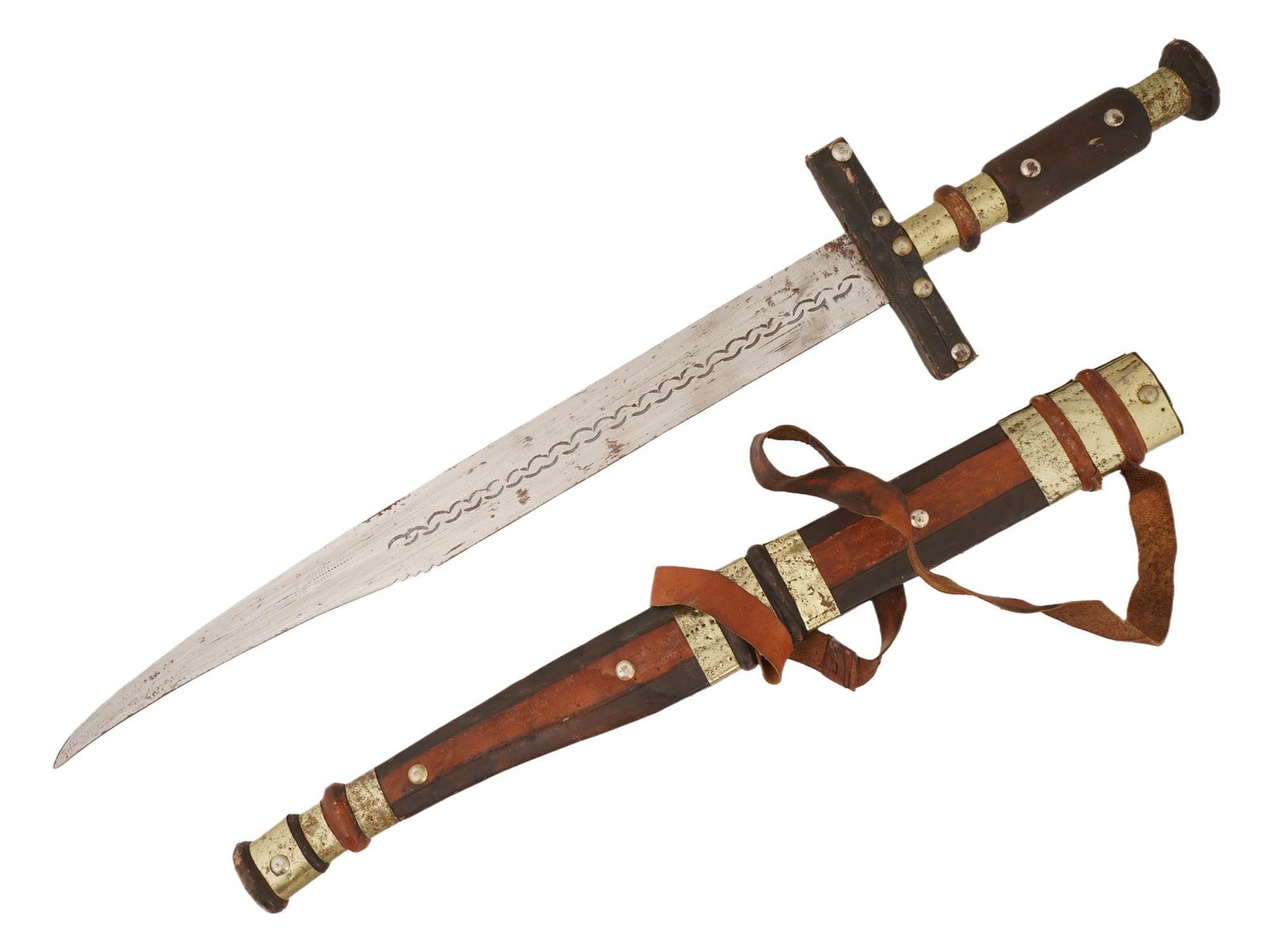 TRADITIONAL AFRICAN TUAREG SWORD TAKOUBA FROM NIGER: A traditional Tuareg sword known as a Takouba, emblematic of the Tuareg warrior elite of the Sahel region, including Niger. The weapon features a broad, straight, double-edged blade, designed for