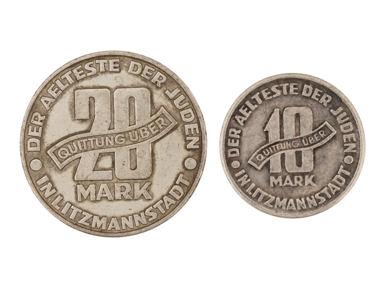 WWII POLISH LITZMANNSTADT GHETTO COINS: Two WWII Polish surrogate currency coins issued for use within the Litzmannstadt Ghetto during the German occupation of World War II, dated 1943. The lot includes 10 Mark and 20 Mark denominations bea