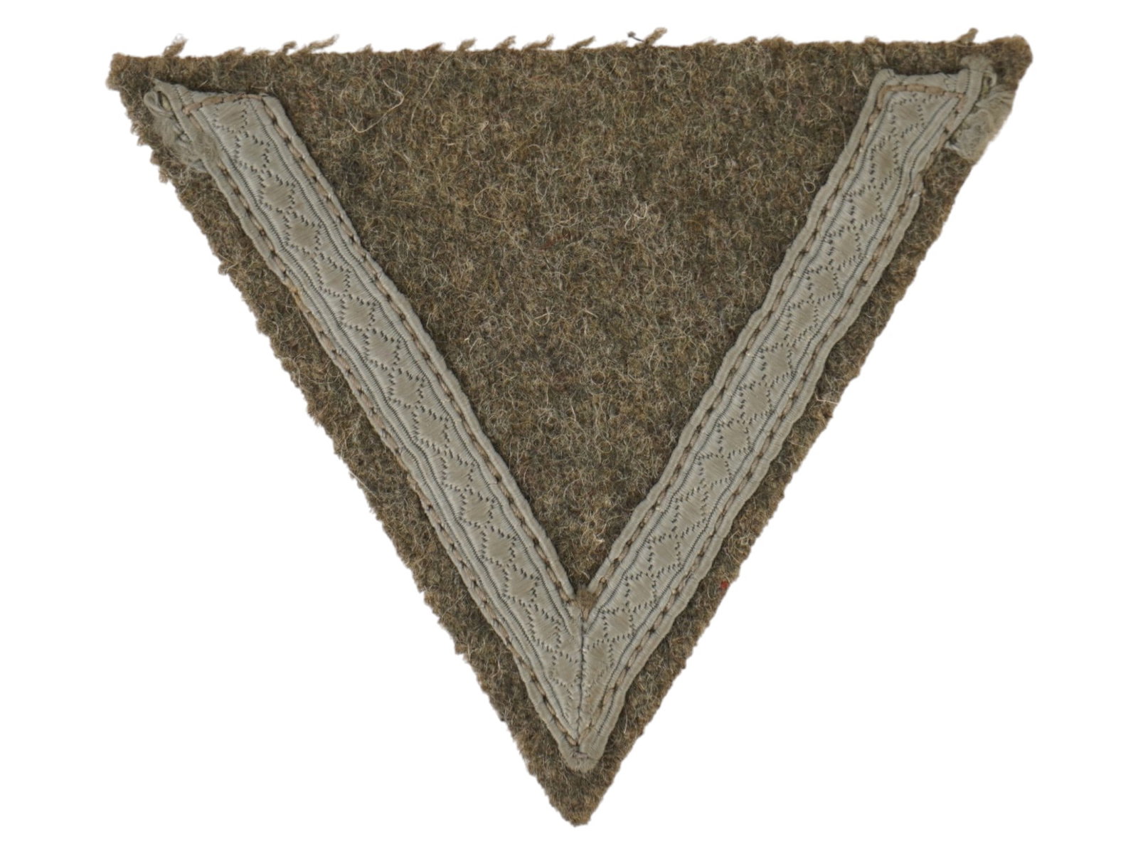 WWII TYPE NAZI GERMAN WEHRMACHT HEER GEFREITER PATCH: A WWII type Nazi German Wehrmacht Heer Gefreiter sleeve rank insignia patch. The insignia features a single chevron embroidered on a field-grey wool backing in the wartime style. Second World War Nazi