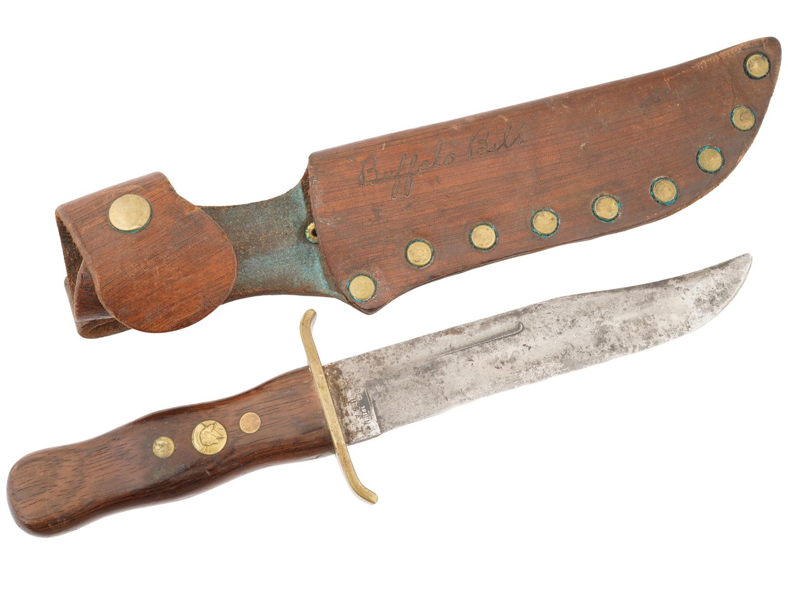 SCHRADE WALDEN BUFFALO BILL BOWIE KNIFE W SHEATH: A vintage Schrade Walden Buffalo Bill commemorative Bowie knife. Model 166. Completed with its original leather sheath. Produced primarily between 1970 and 1971. Designed by Blackie Collins under the 