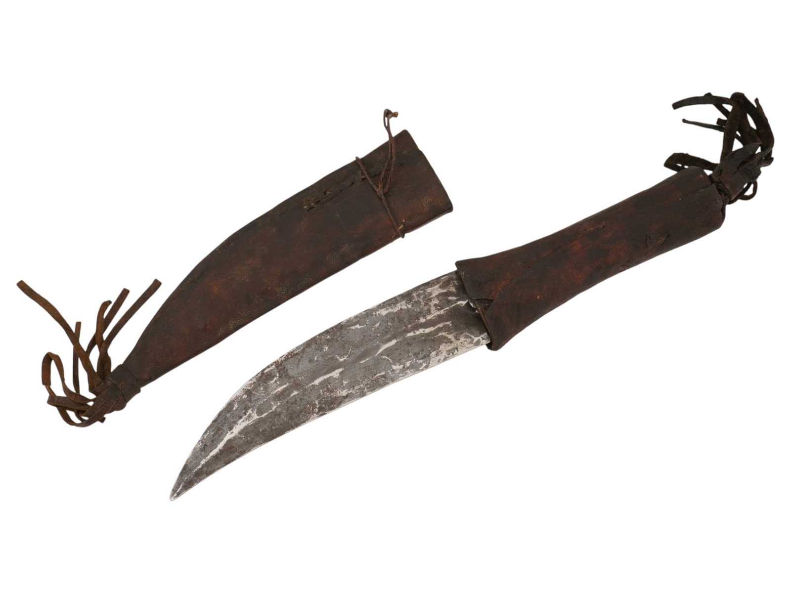 NATIVE AMERICAN HUNTING KNIFE WITH SHEATH: A Native American hunting knife. Presumably of Shoshone origin. Curved stainless steel blade. Dark brown leather handle with a matching tasseled sheath. Hunting Equipment, Knives And Swords, Cold Weap