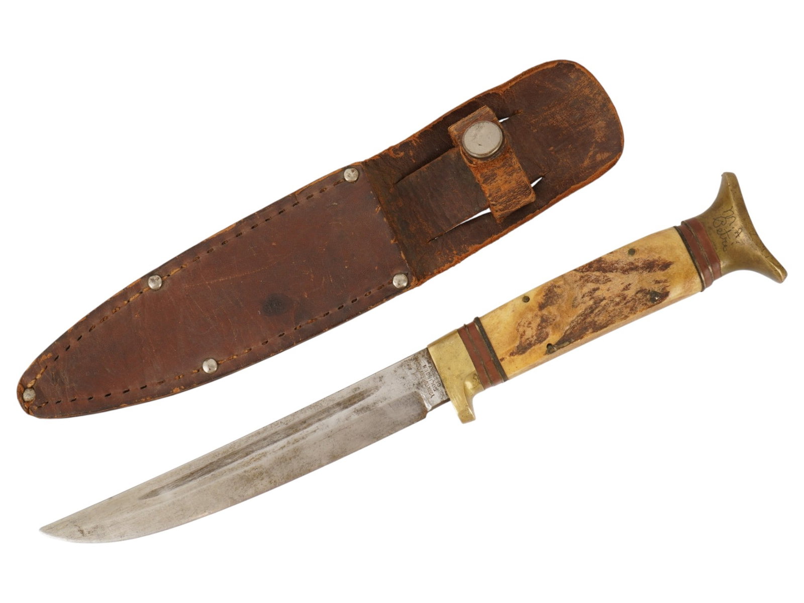 YORK CUTLERY GERMAN HUNTING KNIFE WITH SHEATH: A mid-20th century German hunting knife. Classic stainless steel blade, marked York Cutlery Co., Solingen, Germany. Brass and natural material handle, features an engraved signature of the initial own