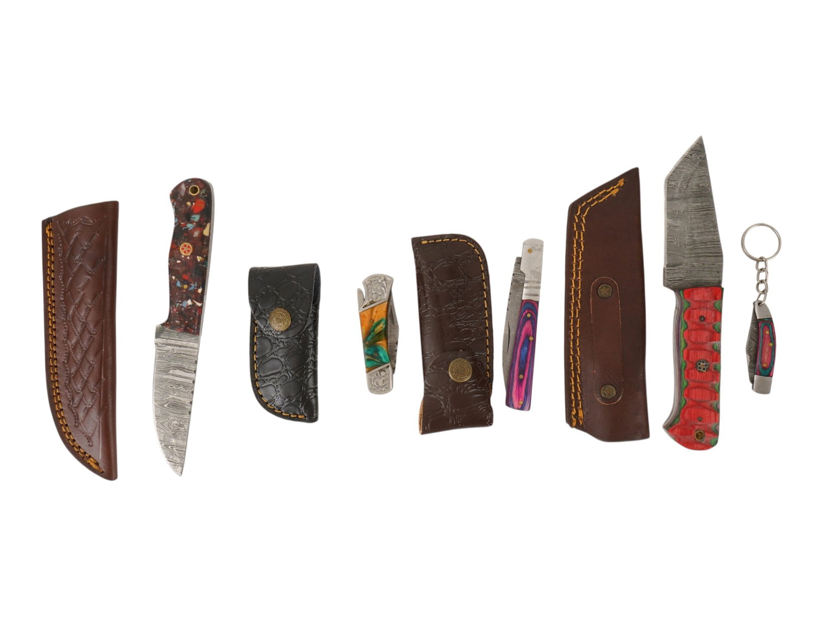 MODERN FOLDING AND UTILITY DAMASCUS STEEL BLADE KNIVES: A collection of modern tactical, folding, and utility knives featuring a variety of custom-style designs. The lot includes Damascus steel blades, colorful composite handles, engraved fittings, and mat