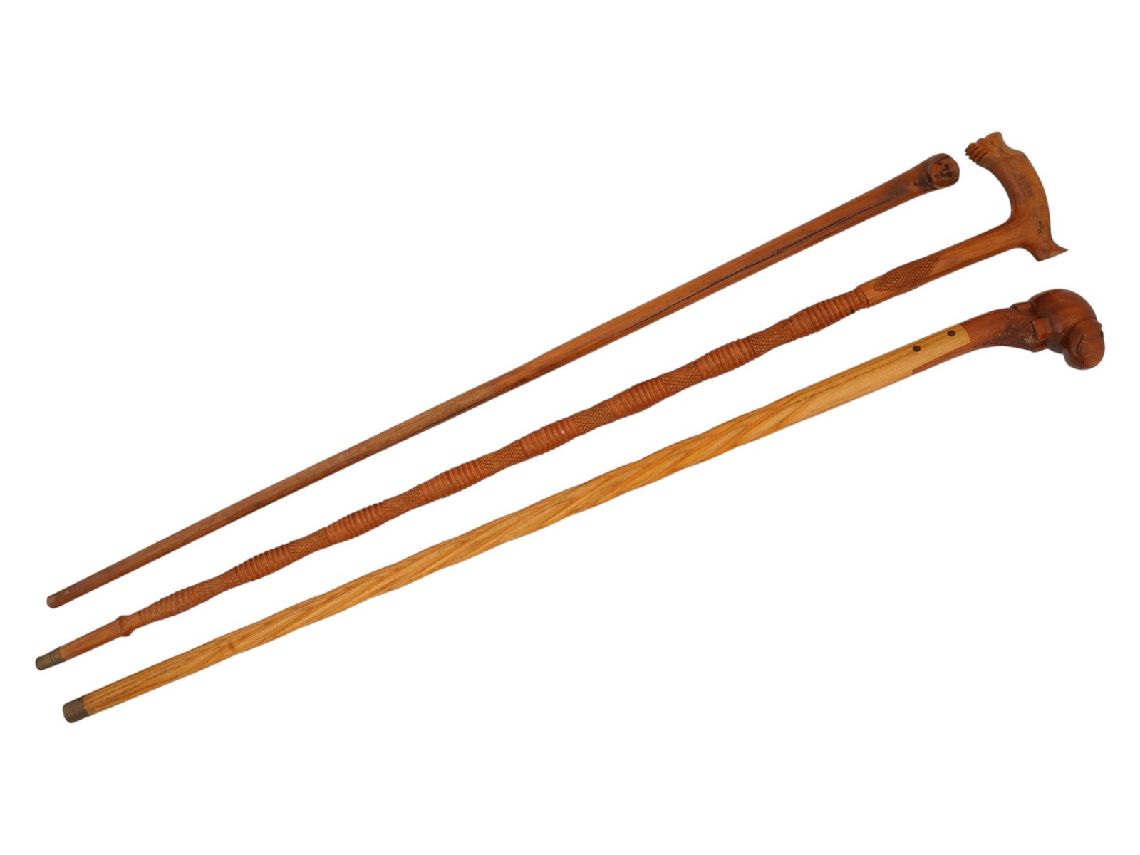 GROUP OF THREE CARVED WOODEN WALKING CANES (1 of 5)