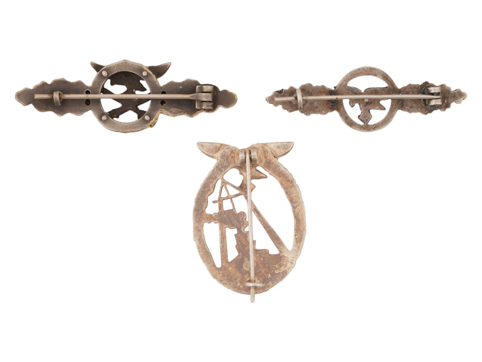 LOT OF THREE WWII TYPE GERMAN LUFTWAFFE BADGES: A lot of three WWII type German Luftwaffe badges: Luftwaffe Sea Battle badge, Close Combat clasp, Transport Glider Squadron clasp. Sea Battle badge: awarded to crews of supply ships, air sea rescue la