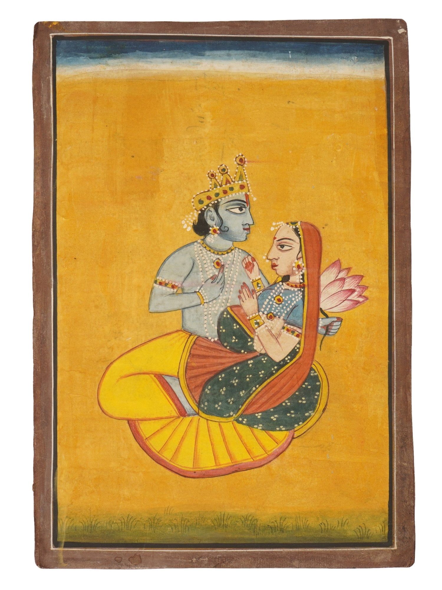 ANTIQUE INDIAN MUGHAL EMPIRE MINIATURE PAINTING: An antique Indian miniature painting. Late Mughal Empire period, 18th to 19th century. Pahari School, Himachal Pradesh. Watercolor and ink on paper. Vertical format. Kirshna and his consort Radha. Col