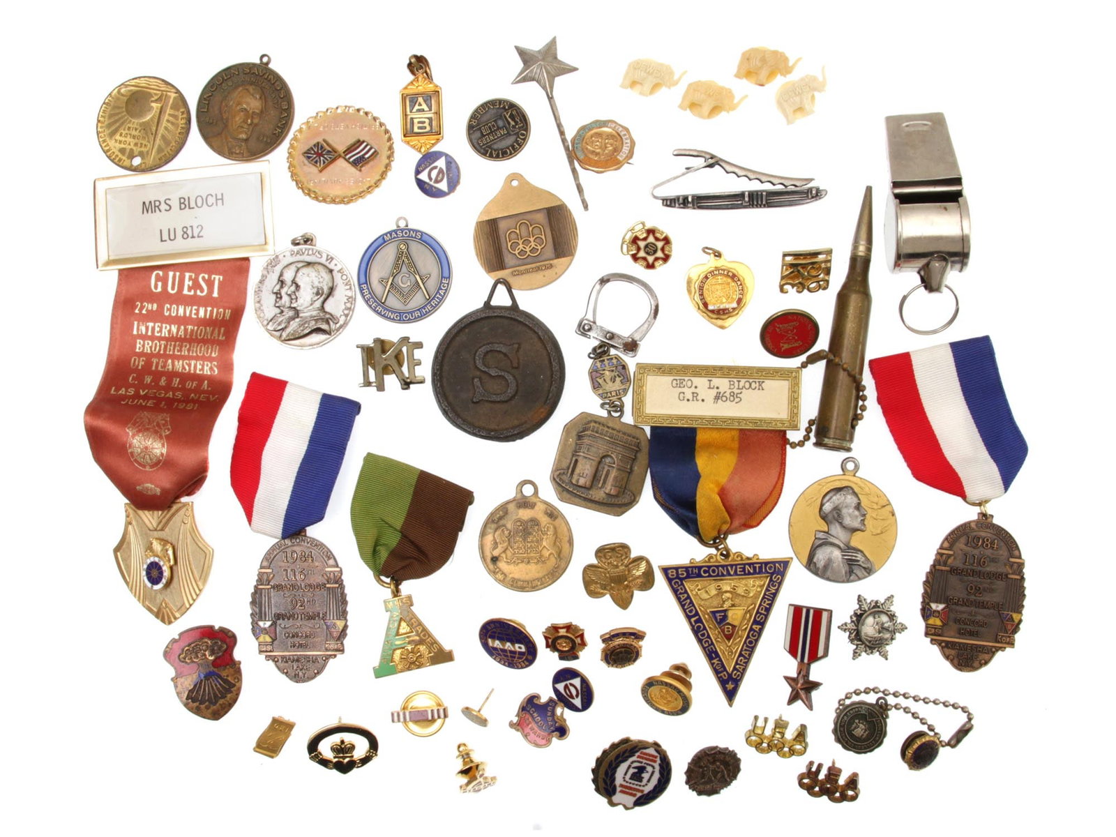 A VINTAGE IDENTIFICATION AND MEMORABLE BADGES LOT: A lot of vintage identification and memorable badges, pendants, and others for the participant in conferences, social movements, social activities. Included: Delegate 22nd convention international