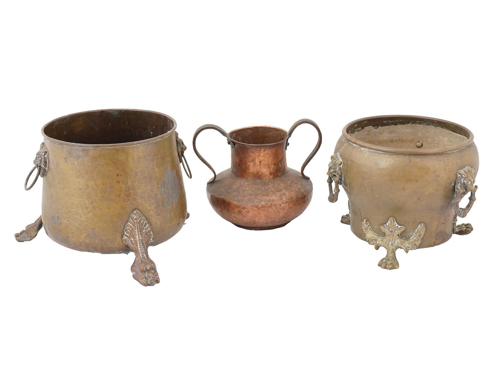 IMPERIAL RUSSIAN COPPER AND BRASS FLOWER POTS AND VASE: A lot of two Imperial Russian copper and brass flowerpotsand a vase. The forged flowerpotsare raised on three figured legs modeled in the form of animal paws. Each features side handles in the form of