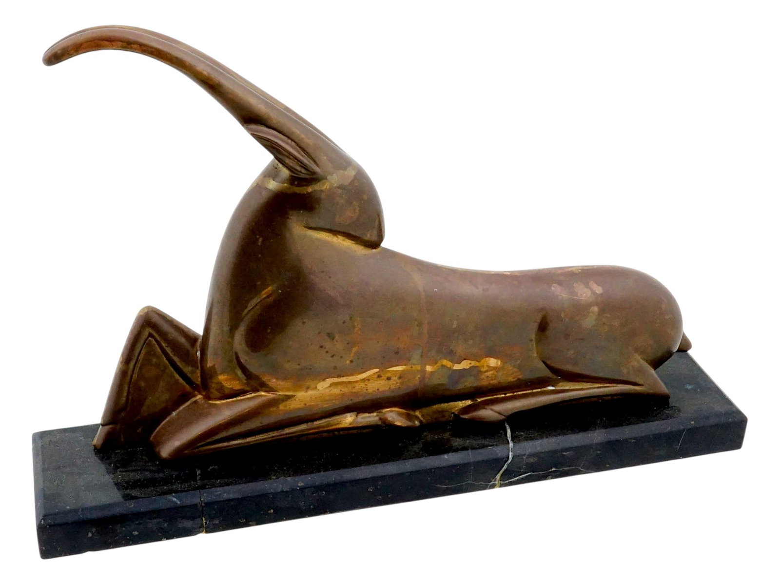 VINTAGE ART DECO GILT BRONZE ANTELOPE SCULPTURE: A vintage Art Deco gilt bronze antelope sculpture. The animal is depicted reclining in an elegant pose on a rectangular black marble base. Circa early to mid-20th century. Figurines, Figures, Statues,
