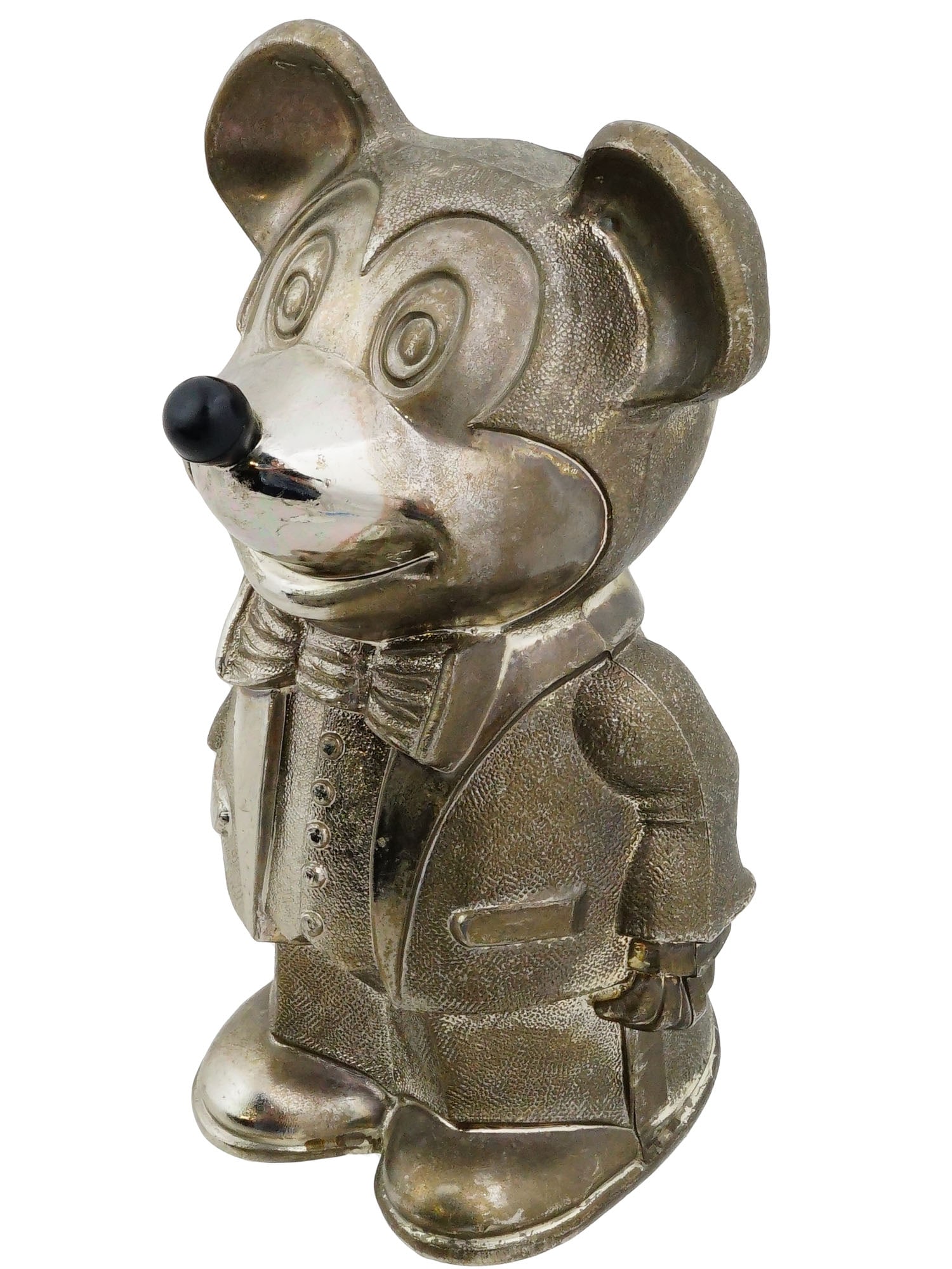 VTG SILVER PLATED WALT DISNEY MICKEY MOUSE COIN BANK: A vintage silver-plated Mickey Mouse coin bank produced under Walt Disney license. The figure is shown in formal tuxedo attire with contrasting polished and textured finishes. Vintage Coins Banks And 