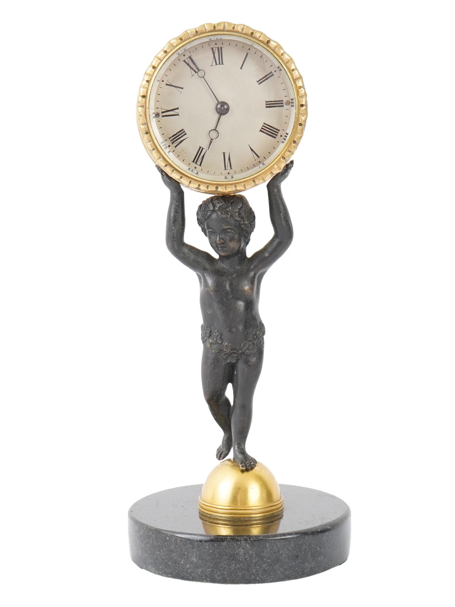 FRENCH BRONZE CLOCK MARBLE BASE W PLATFORM ESCAPEMENT: A French patinated bronze clock with a platform escapement. A body of the clock depicts a cherub balancing on a leg and holding the clock above his head. Mounted on a semi circular domed shaped gold