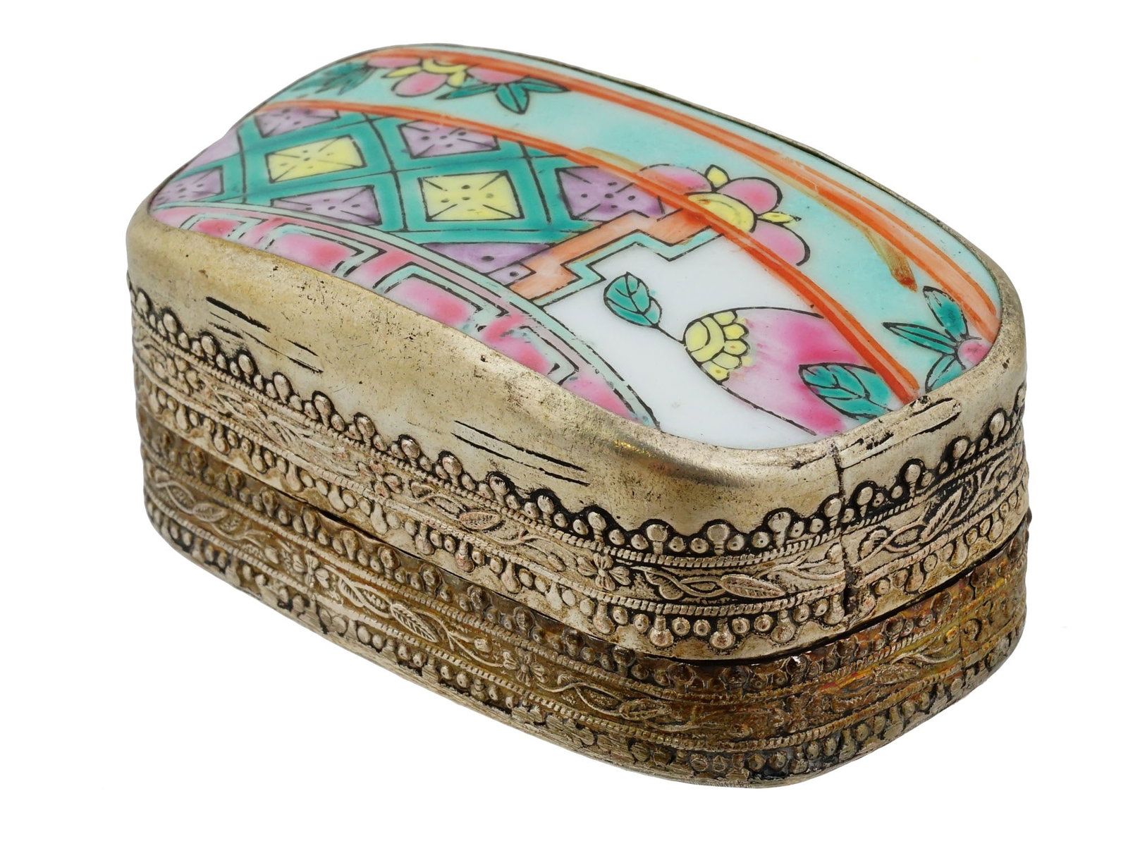 ANTIQUE CHINESE PORCELAIN SILVER SHARD TRINKET BOX: An antique Chinese porcelain shard trinket box featuring a mounted Famille Rose porcelain panel. The silver body is decorated with ornate repousse detailing throughout. Antique Chinese Porcelain Trink