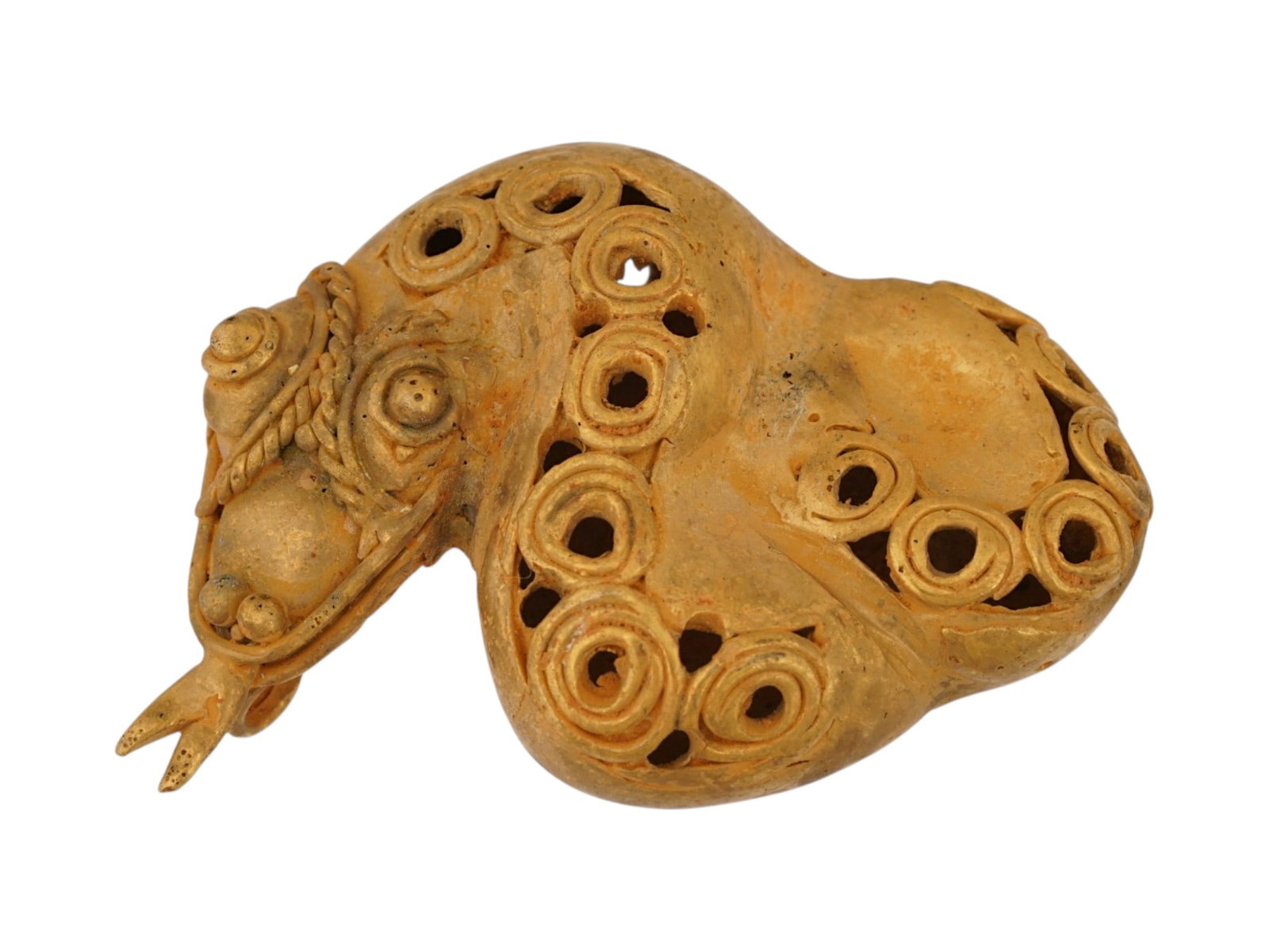 ANCIENT PRE COLUMBIAN TUMBAGA SERPENT PENDANT: An ancient Pre Columbian Tumbaga figure or figural pendant depicting a sinuous serpent. A tumbaga, alloy of copper and gold, ornament, cast using the lost wax process, with its surface enriched by the