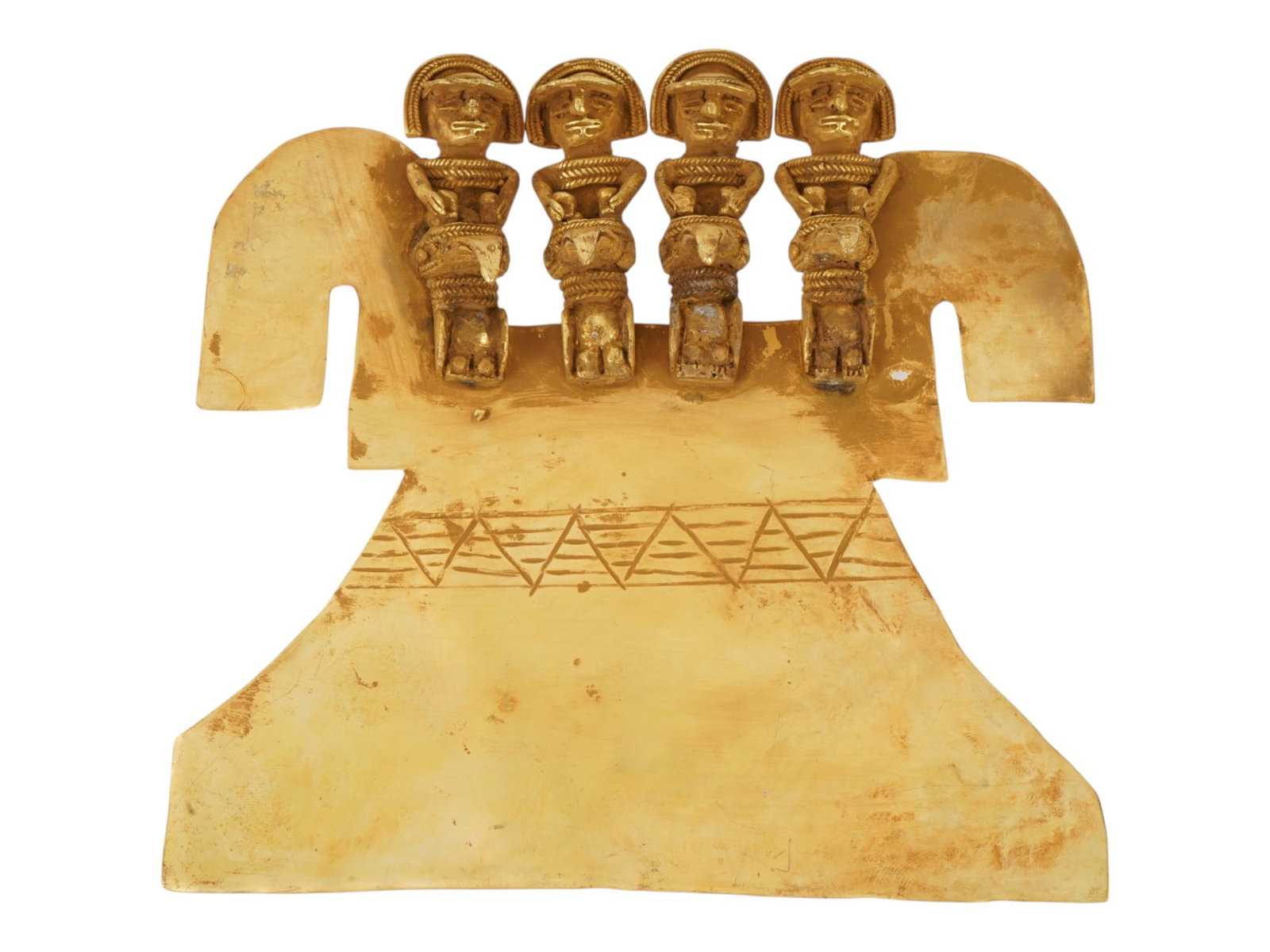 PRE COLUMBIAN TAIRONA TUMBAGA ANTHROPOMORPHIC PECTORAL: An ancient Pre Columbian Tairona tumbaga pectoral, an ornamental breastplate worn on the chest. Tumbaga, an alloy of gold and copper, showcases the metallurgical proficiency of Pre Columbian Mesoameri