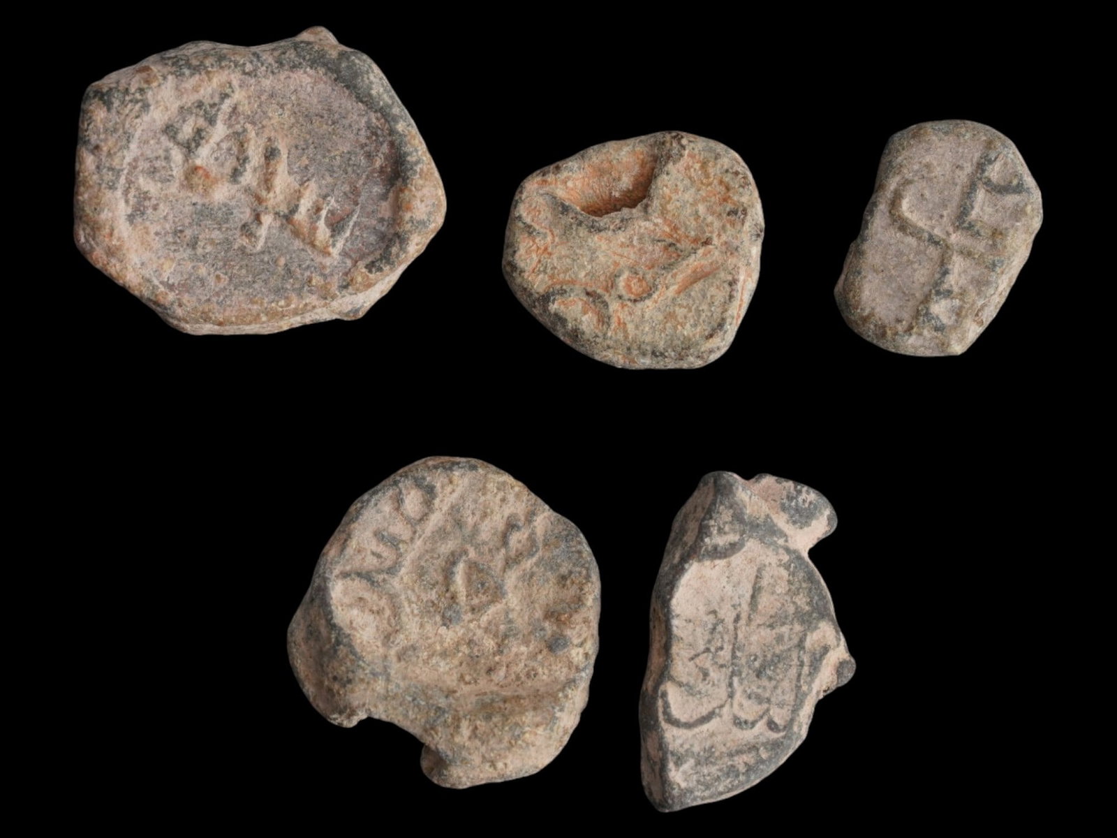 ANCIENT ISLAMIC LEAD SEALS WITH ARABIC INSCRIPTIONS (1 of 2)