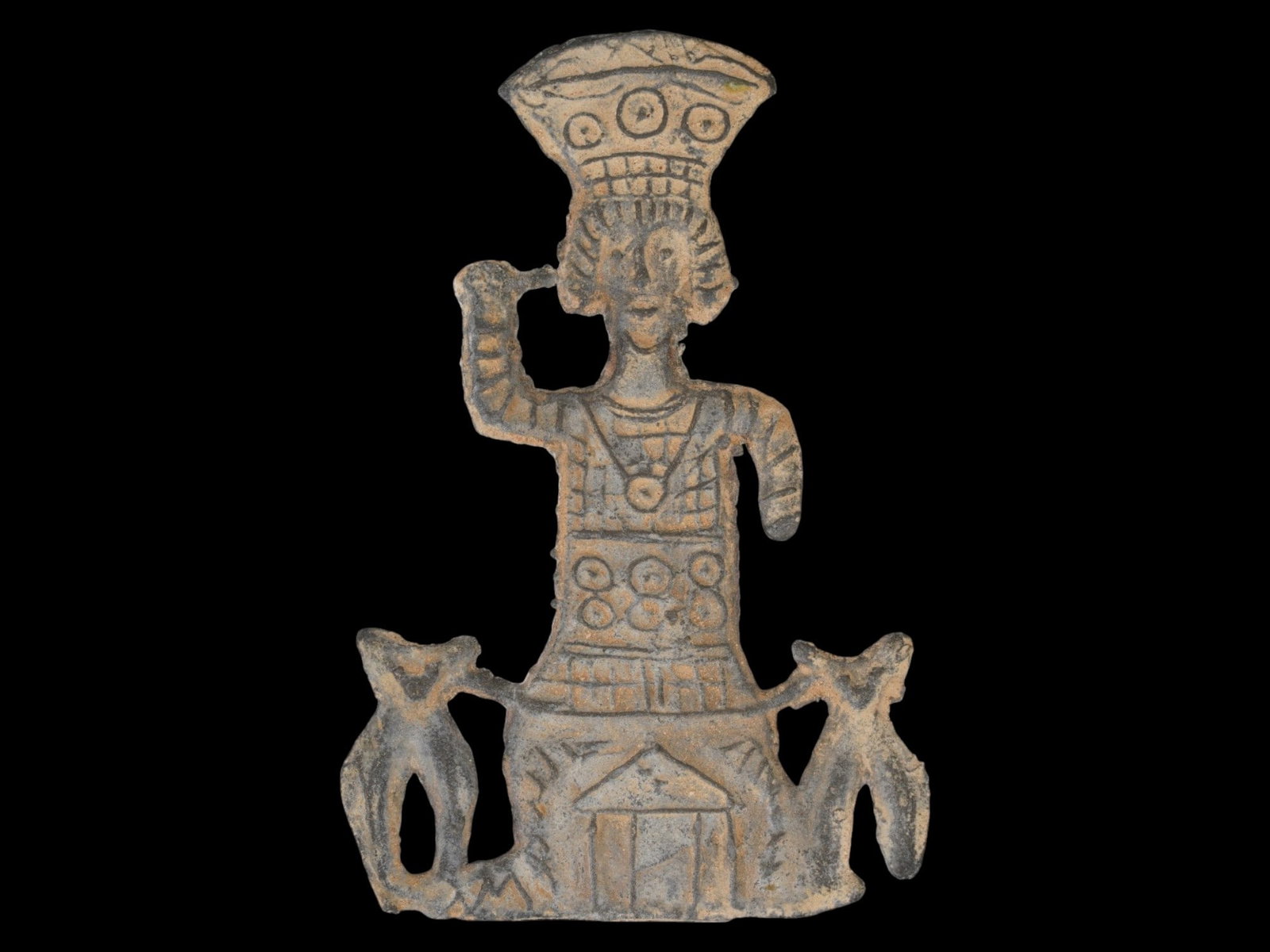 ANCIENT ROMAN HOLY LAND PLAQUE JUPITER HELIOPOLITANUS: An ancient Holy Land votive plaque depicting the crowned deity Jupiter Heliopolitanus flanked by a temple and two sacred bulls. The plaque dates to the Roman period, circa 200 BC to 200 AD, and reflec