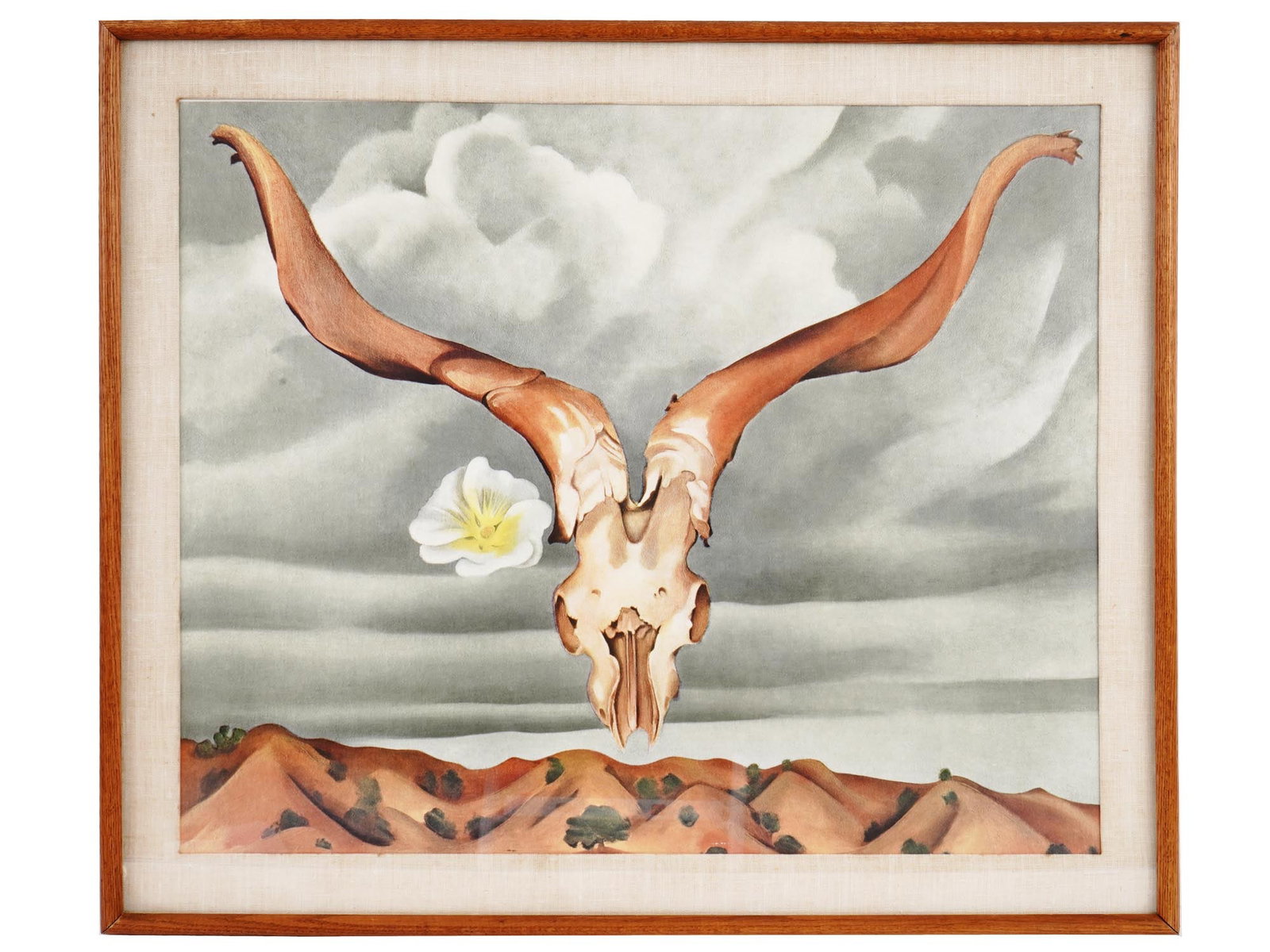 RAMS HEAD OFFSET LITHOGRAPH AFTER GEORGIA O KEEFFE: Color lithograph on paper. After the 1935 painting titled Rams Head, White Hollycock, and Little Hills by Georgia Totto O Keeffe, 1887 to 1986, an American Modernist artist. The artwork depicts a Surr