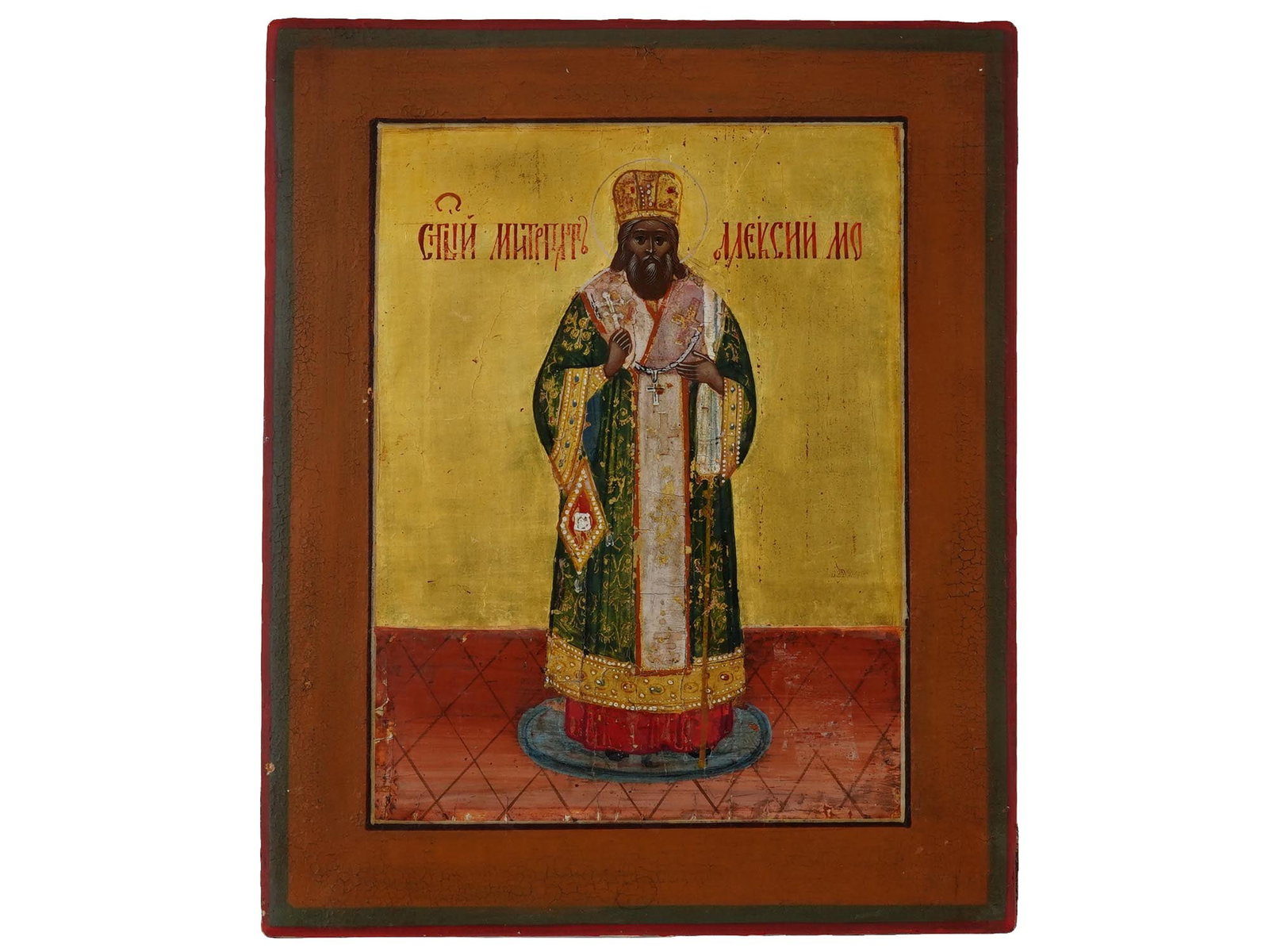 ANTIQUE 19TH C RUSSIAN ORTHODOX ICON OF SAINT ALEXIUS: An antique 19th century Russian Orthodox icon, representing Saint Alexius. Mixed media painting: egg tempera, gesso, levkas and gilding on a wood board. The character is named in Church Slavonic. The 