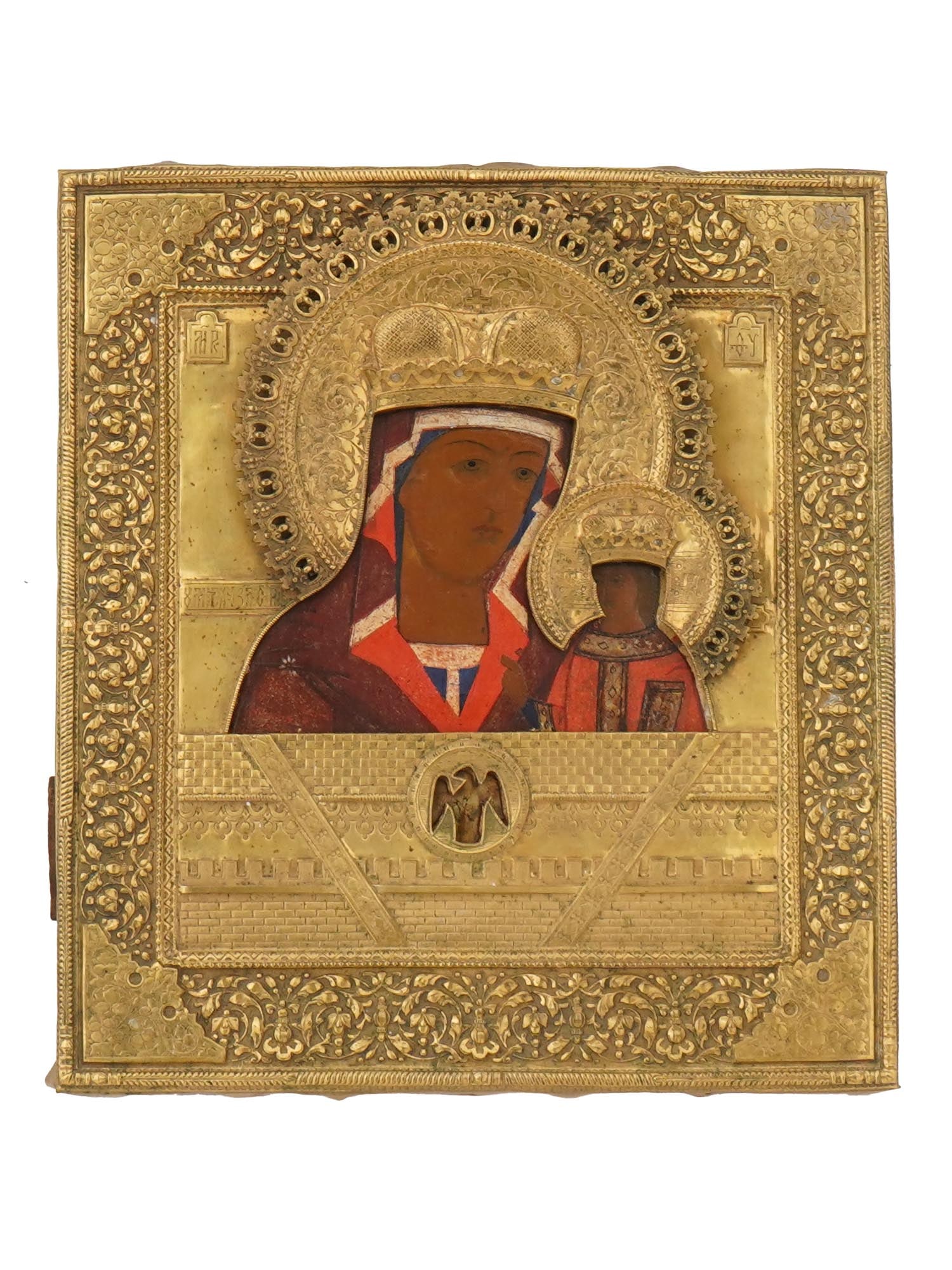 18TH C RUSSIAN SOFTENING EVIL HEARTS ICON IN OKLAD: An18th century Russian Orthodox icon representing Our Lady of the Softening of Evil Hearts. Mixed media painting: egg tempera, gesso, and levkas on a wood board. Presented in a gilded chased and embos