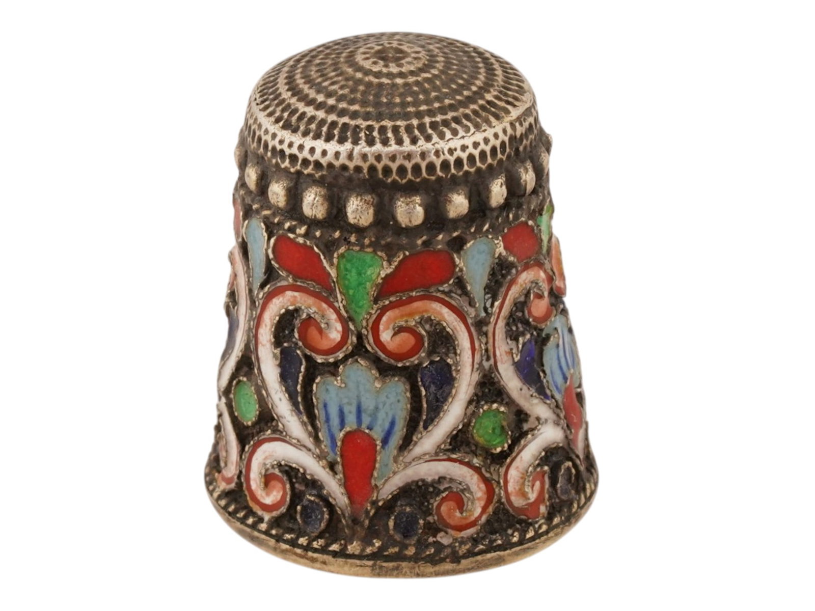 RUSSIAN 88 GILT SILVER AND CLOISONNE ENAMEL THIMBLE: A Russian 88 gilt silver and enamel sewing thimble. The ware is adorned with a polychrome enamel design representing geometrical, foliate scroll, and foliage ornaments made in the Cloisonne technique.