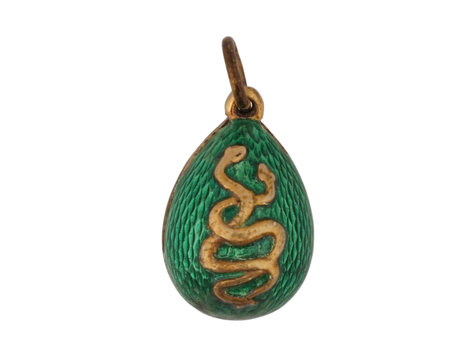 RUSSIAN SILVER GUILLOCHE ENAMEL EASTER EGG PENDANT: A Russian 84 gilt silver Easter egg pendant consisting of two parts decorated with shimmering green guilloche enamel throughout. The front part is adorned with two intertwined snakes in relief to the 