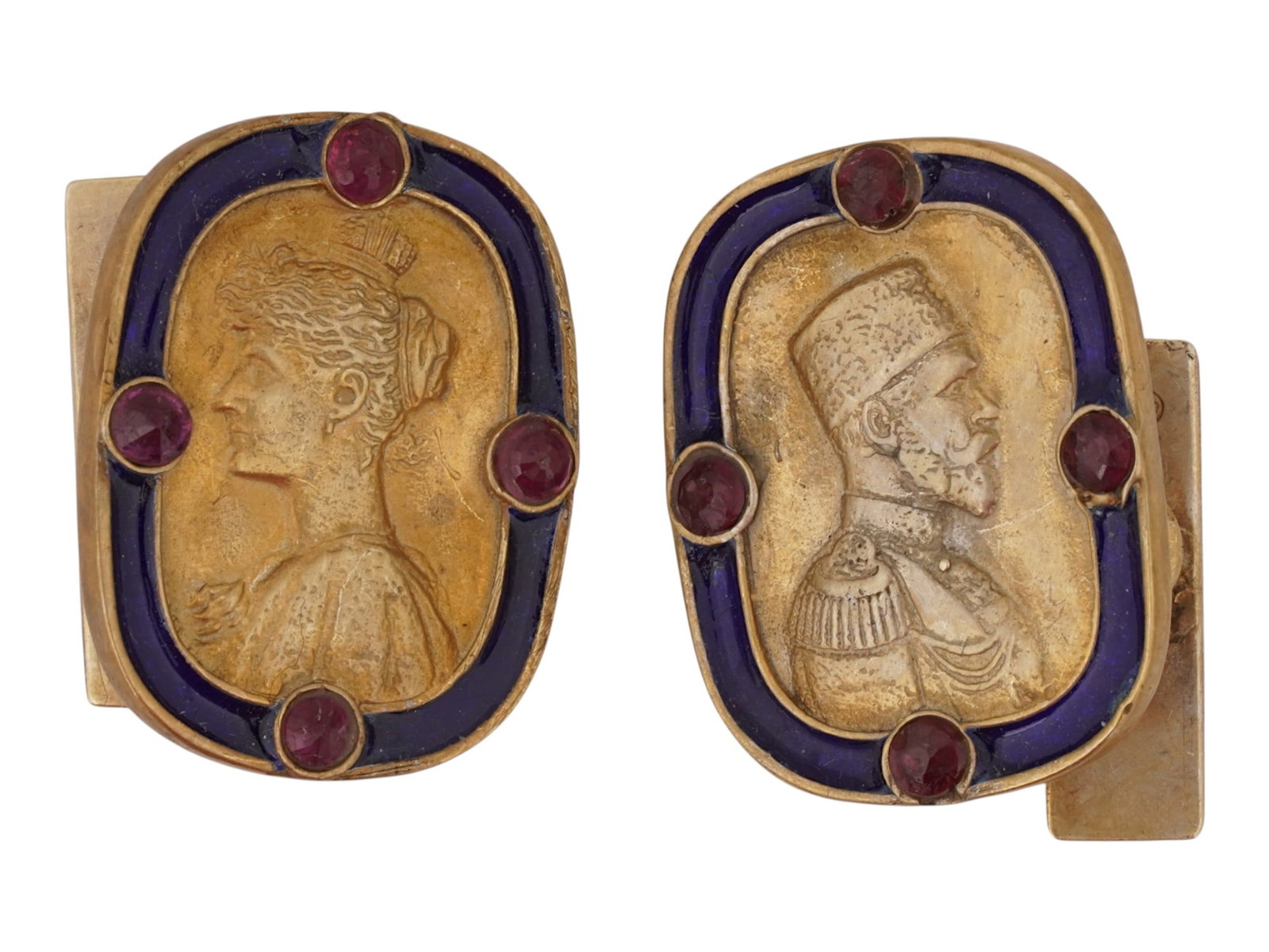 RUSSIAN SILVER ENAMEL IMPERIAL CUFFLINKS W RUBIES: A pair of Russian Imperial presentation gilt silver chain-style cufflinks. The front parts represent the profile portraits of the last Emperor Nicholas II and his wife Alexandra Feodorovna. Cobalt blu