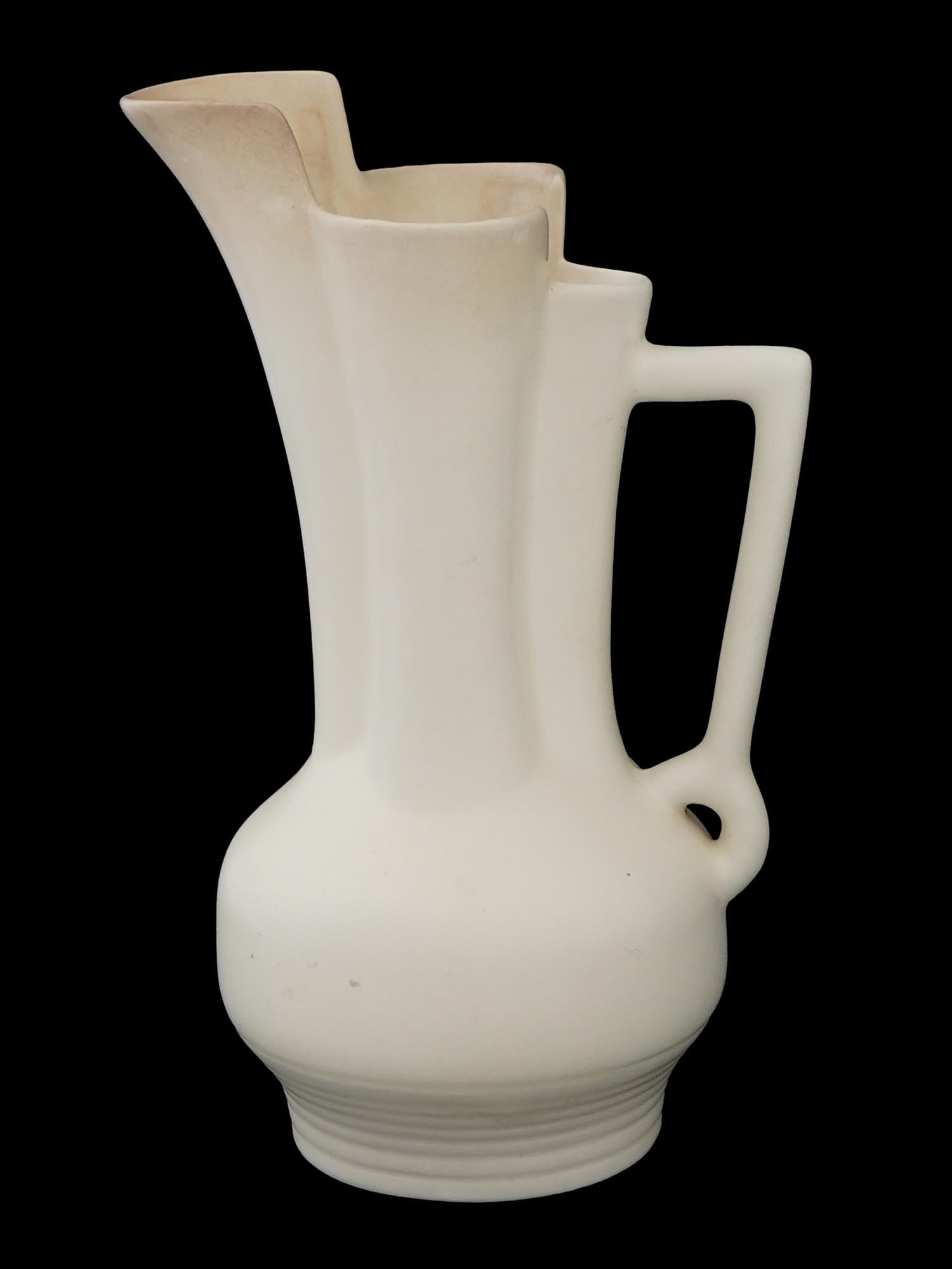 ART DECO ENGLISH BESWICK POTTERY PITCHER: A glazed ceramic pitcher by John Beswick Ltd, an Englilsh pottery manufacturer active from 1894 to 2002. Ca. 1930s. Art Deco design. Marked Beswick, 144-2 on the bottom. Collectible Pottery And Cerami