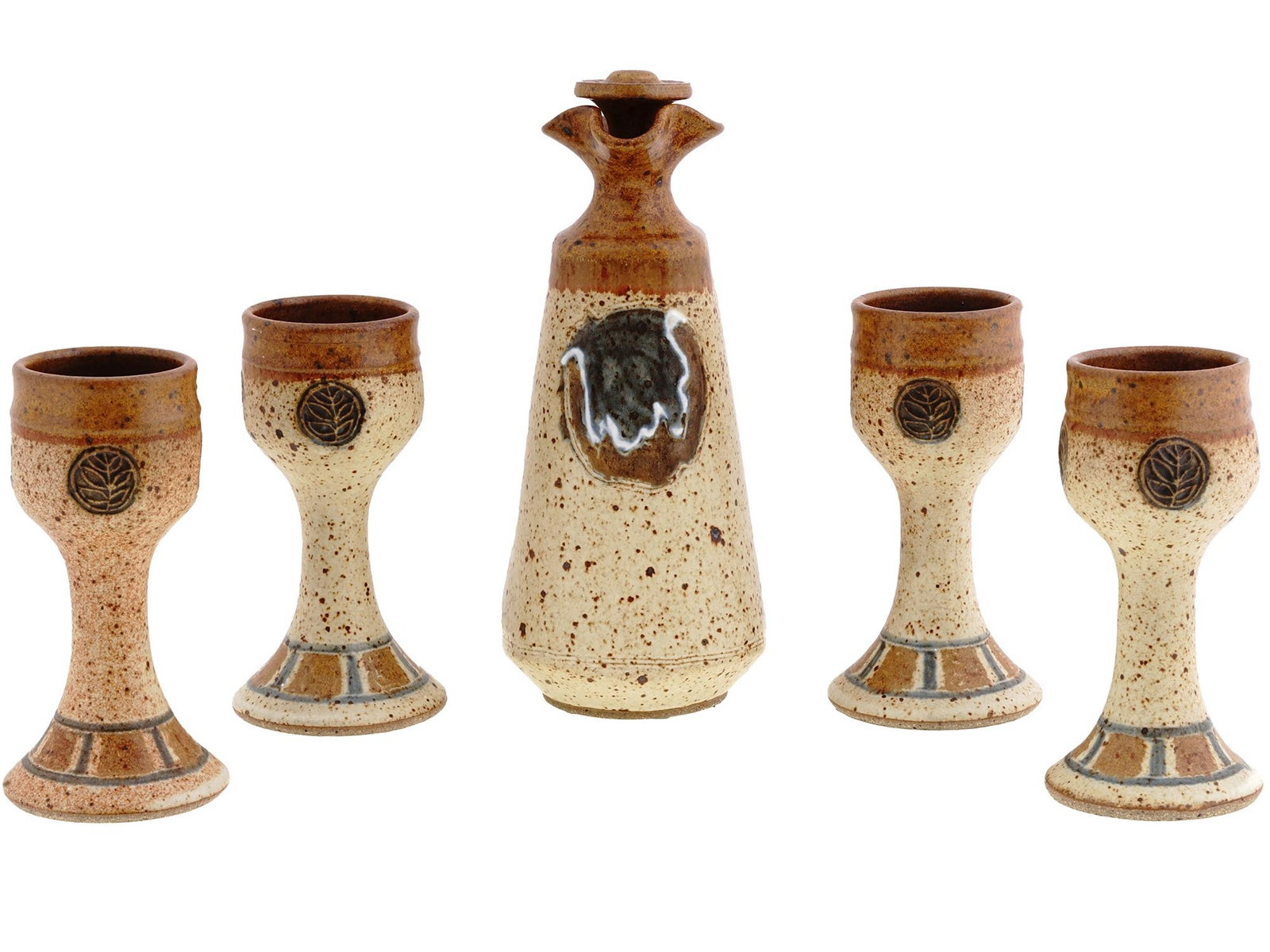 VINTAGE JANET MCCAMPBELL STONEWARE POTTERY SET: A vintage handcrafted stoneware pottery drinkware set including a carafe or decanter and four goblets. Handcrafted by Janet McCampbell in her studio on the banks of Stock Creek in East Tennessee. Each
