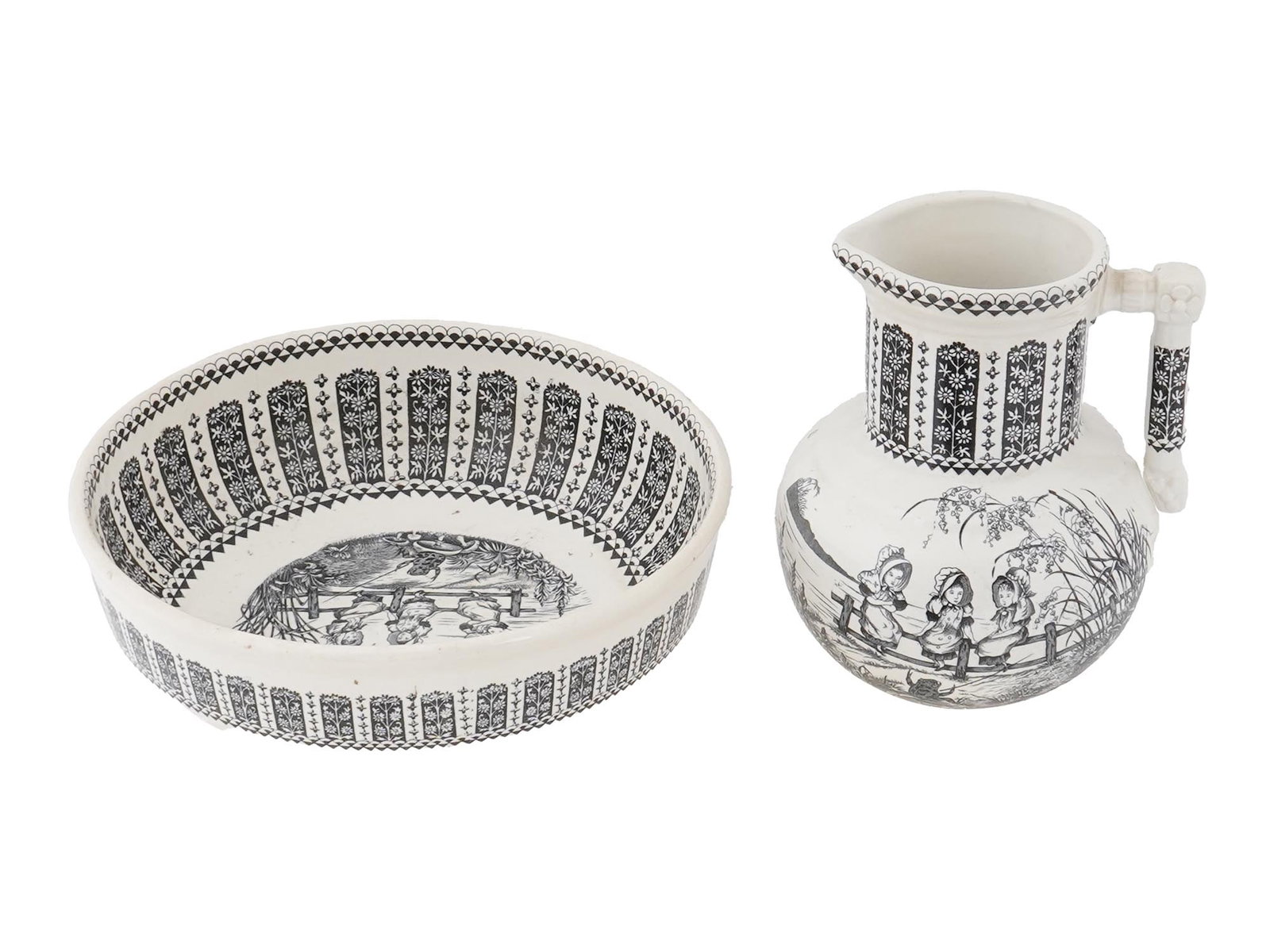 TRANSFERWARE PITCHER AND BOWL SET AFTER KATE GREENAWAY: A vintage transferware pitcher and bowl set after Kate Greenaway. The design was first designed by Kate Greenway using transferware technique around the 1880s. The classic shaped pitcher with a round 