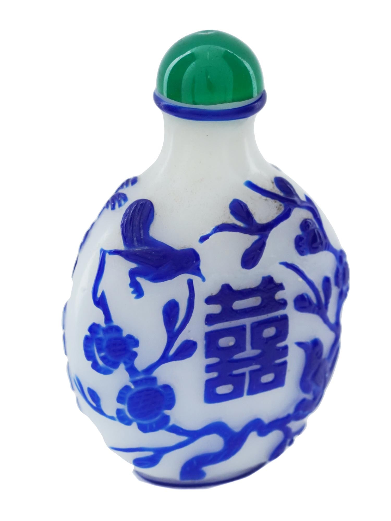 ANTIQUE CHINESE PEKING GLASS SNUFF BOTTLE W STOPPER: An antique Chinese Peking glass snuff bottle. The bottle is adorned with etched designs representing cobalt blue branches with blossoming flowers, trees, animals, cranes, and birds. The bottle is ador