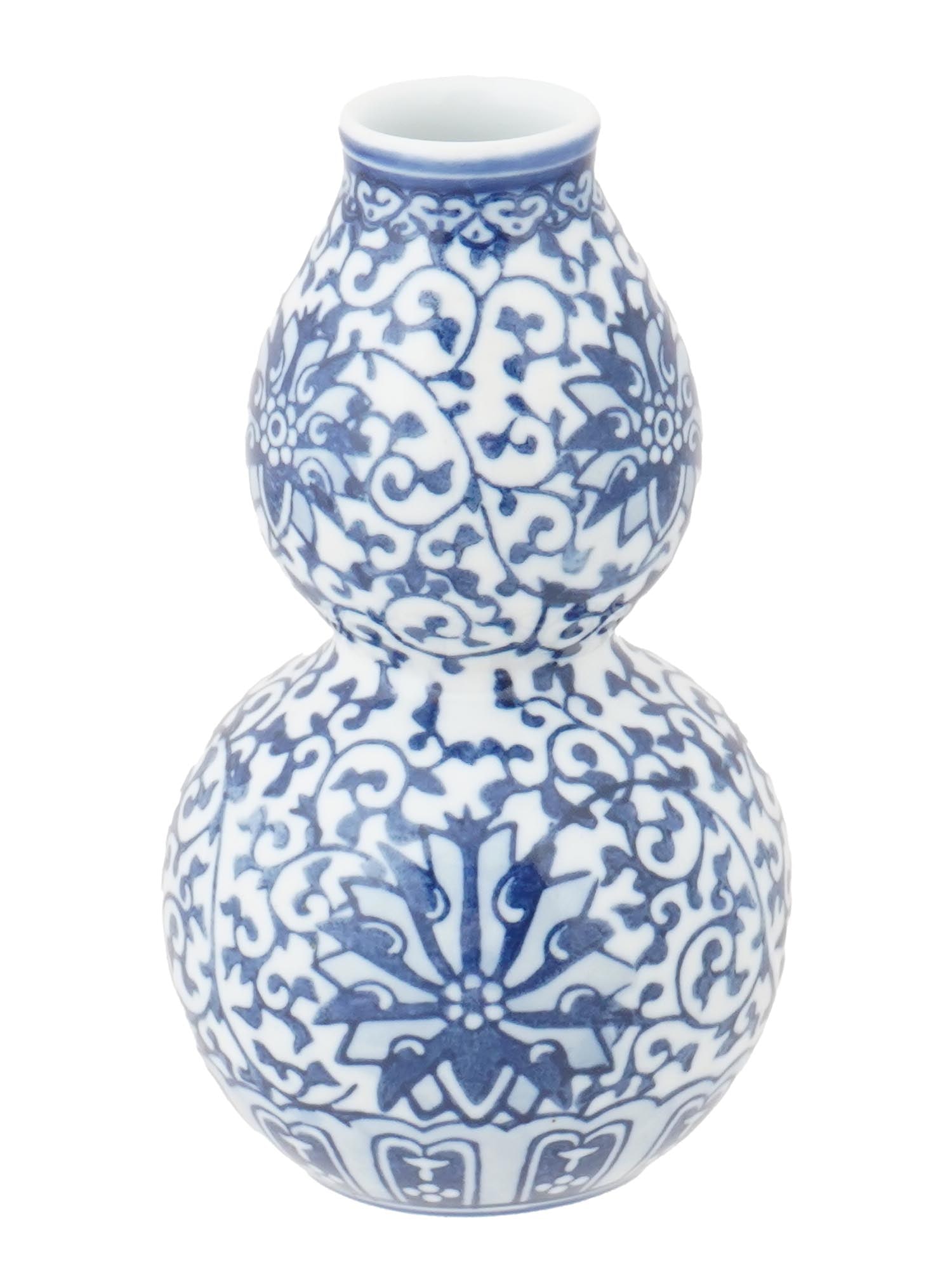 CHINESE JINGDEZHEN HAND PAINTED GOURD PORCELAIN VASE: A Chinese Jingdezhen hand painted double gourd porcelain vase. The vase is made from quality translucent blue and white porcelain and is marked Jingdezhen Zhi on the base. There are pottery clay burnt