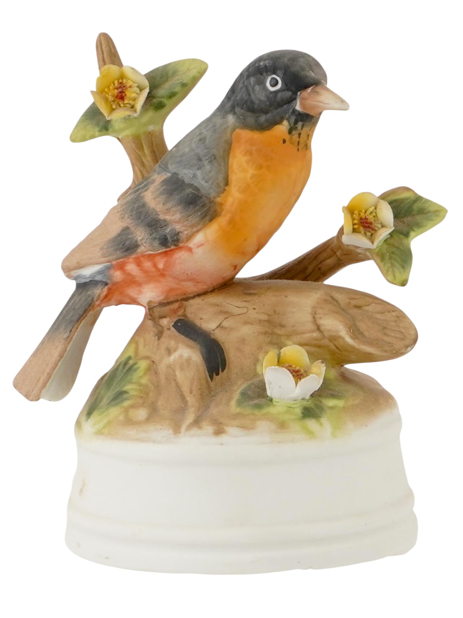 VINTAGE ITALIAN PORCELAIN ROBIN BIRD MUSIC BOX: A vintage Italian porcelain robin bird sculptured music box by Eda Mann. The music box is decorated with a figurine of a robin bird sitting in flowers. Raised on the base. Marked with blue ink on the 