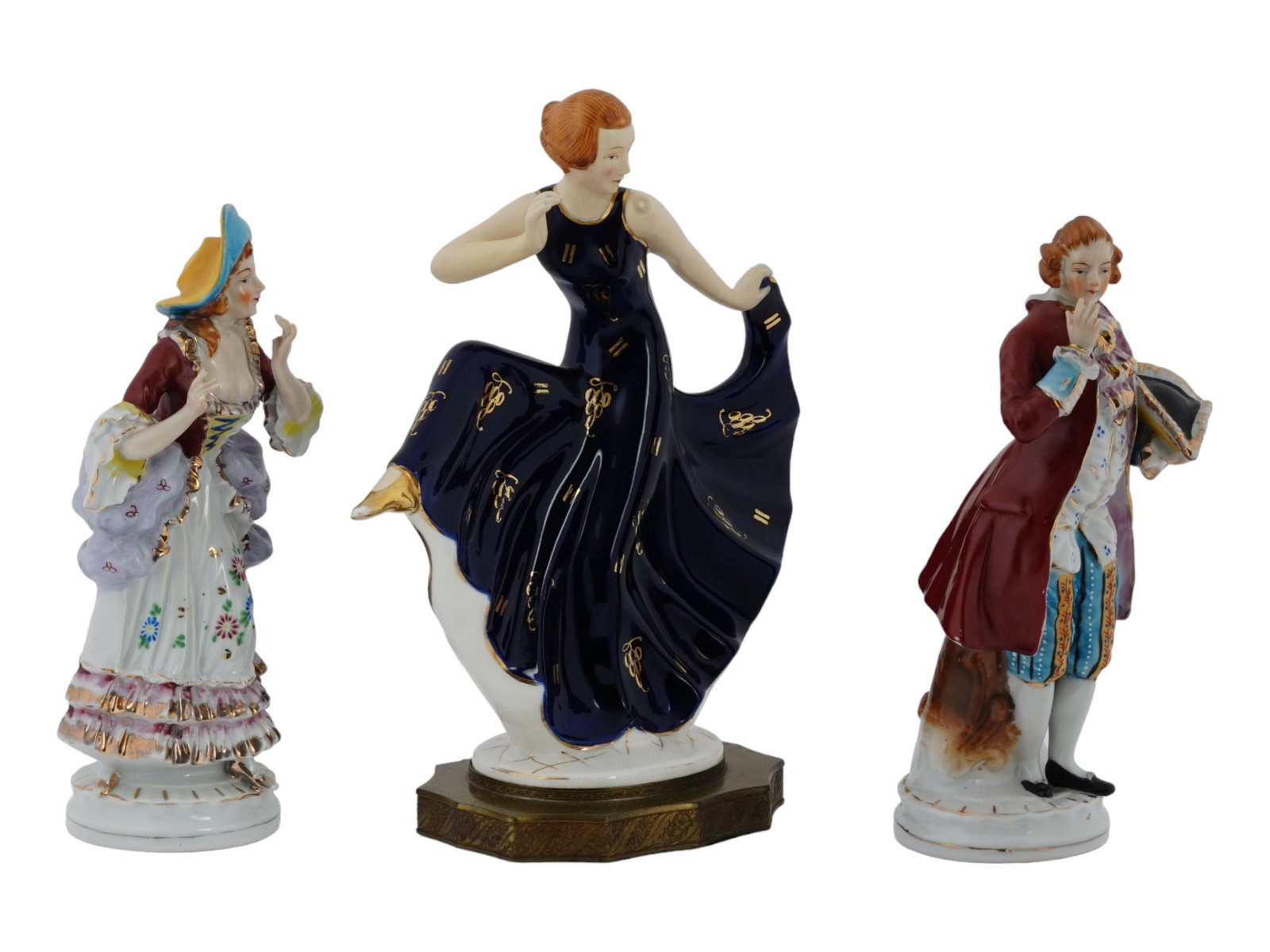 OCCUPIED JAPAN HAND PAINTED PORCELAIN FIGURINES: A lot of three mid-20th century hand-painted porcelain figurines. A pair of figures of a man and woman in Rococo style, each is marked Made in Occupied Japan on the bottom. A figure of a dancing woman